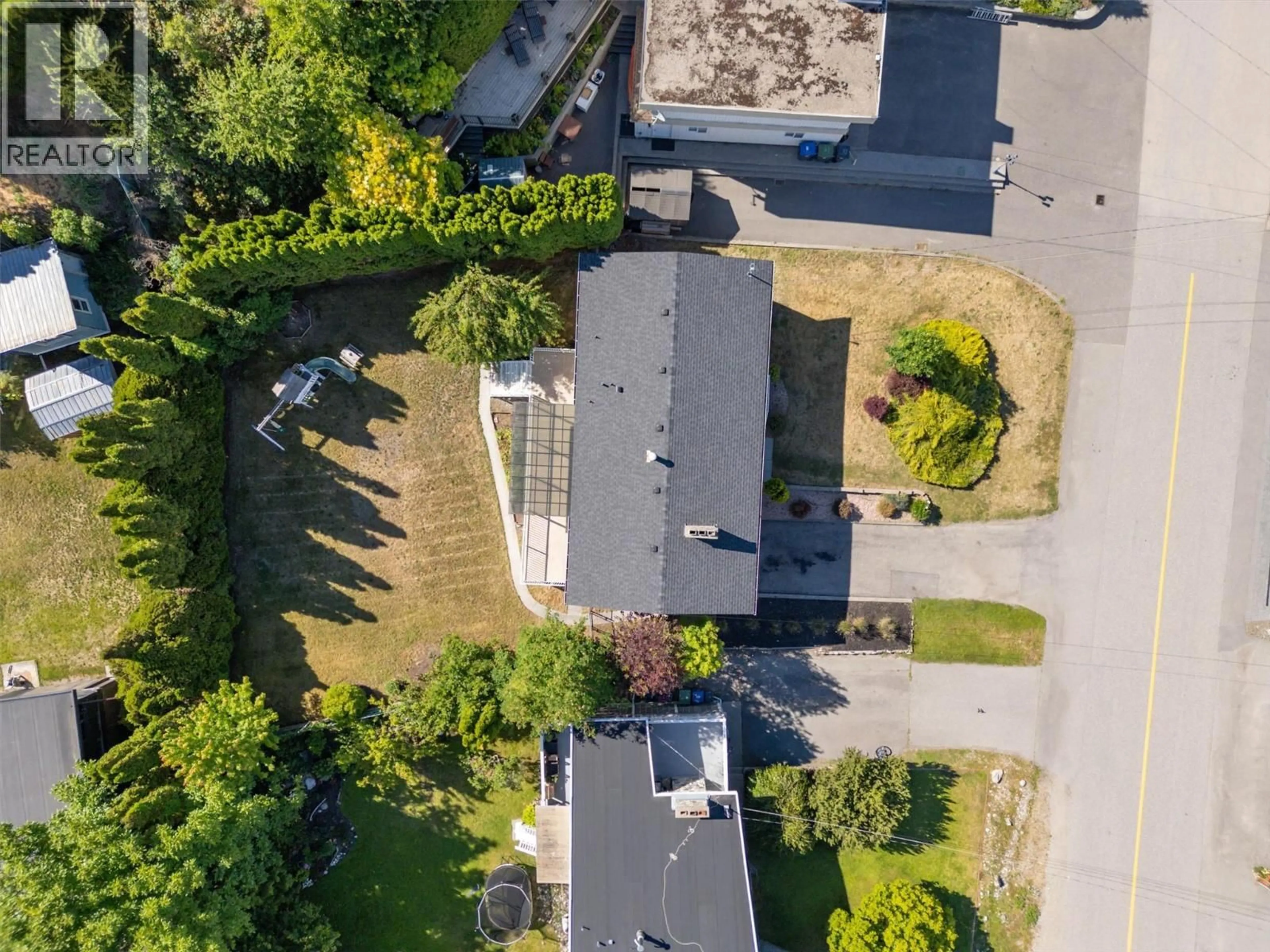 A pic from outside/outdoor area/front of a property/back of a property/a pic from drone, street for 2612 CASA LOMA ROAD, West Kelowna British Columbia V1Z1T5