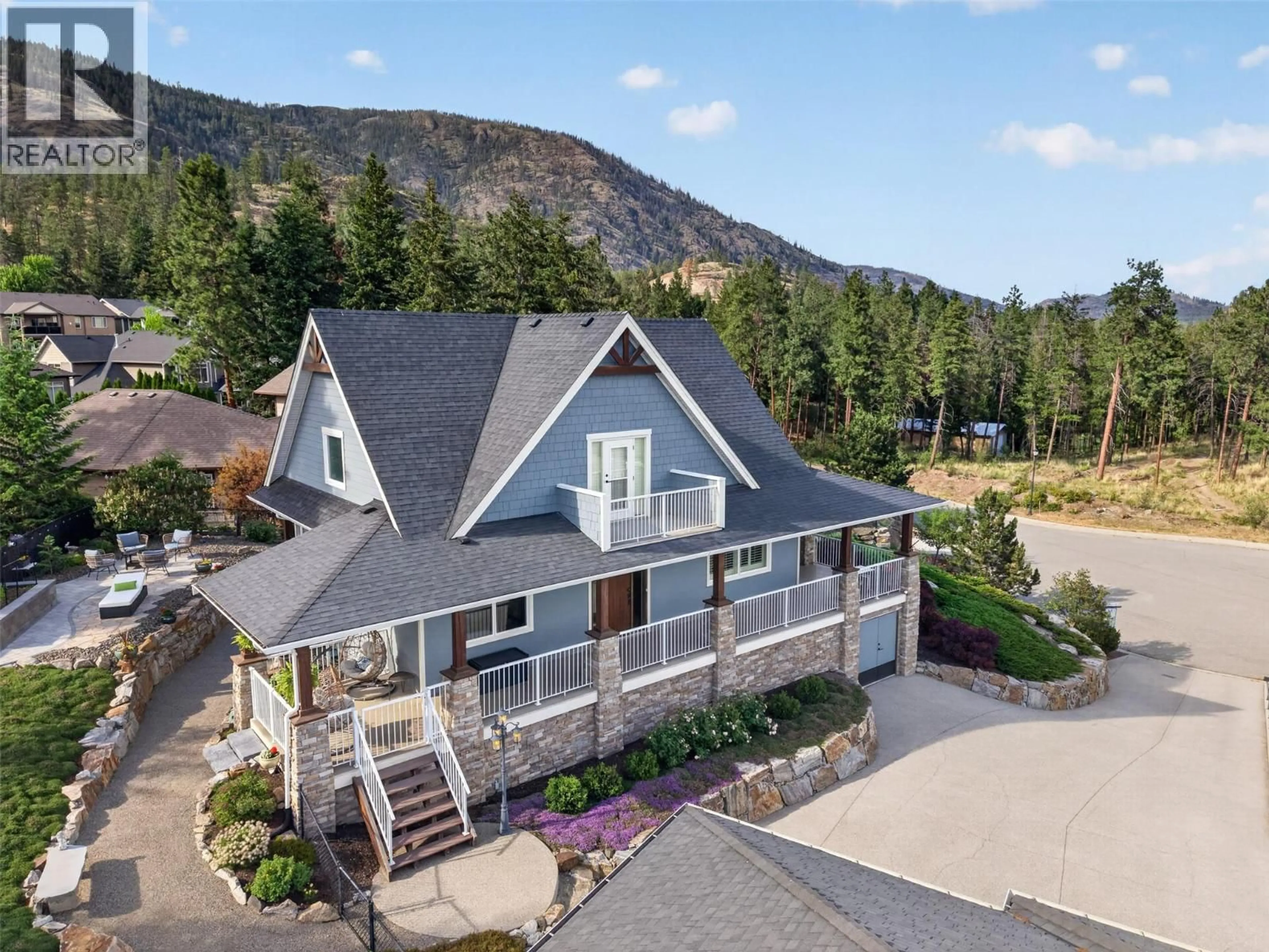 A pic from outside/outdoor area/front of a property/back of a property/a pic from drone, mountain view for 2478 STONE GROVE CRESCENT, West Kelowna British Columbia V4T3A8