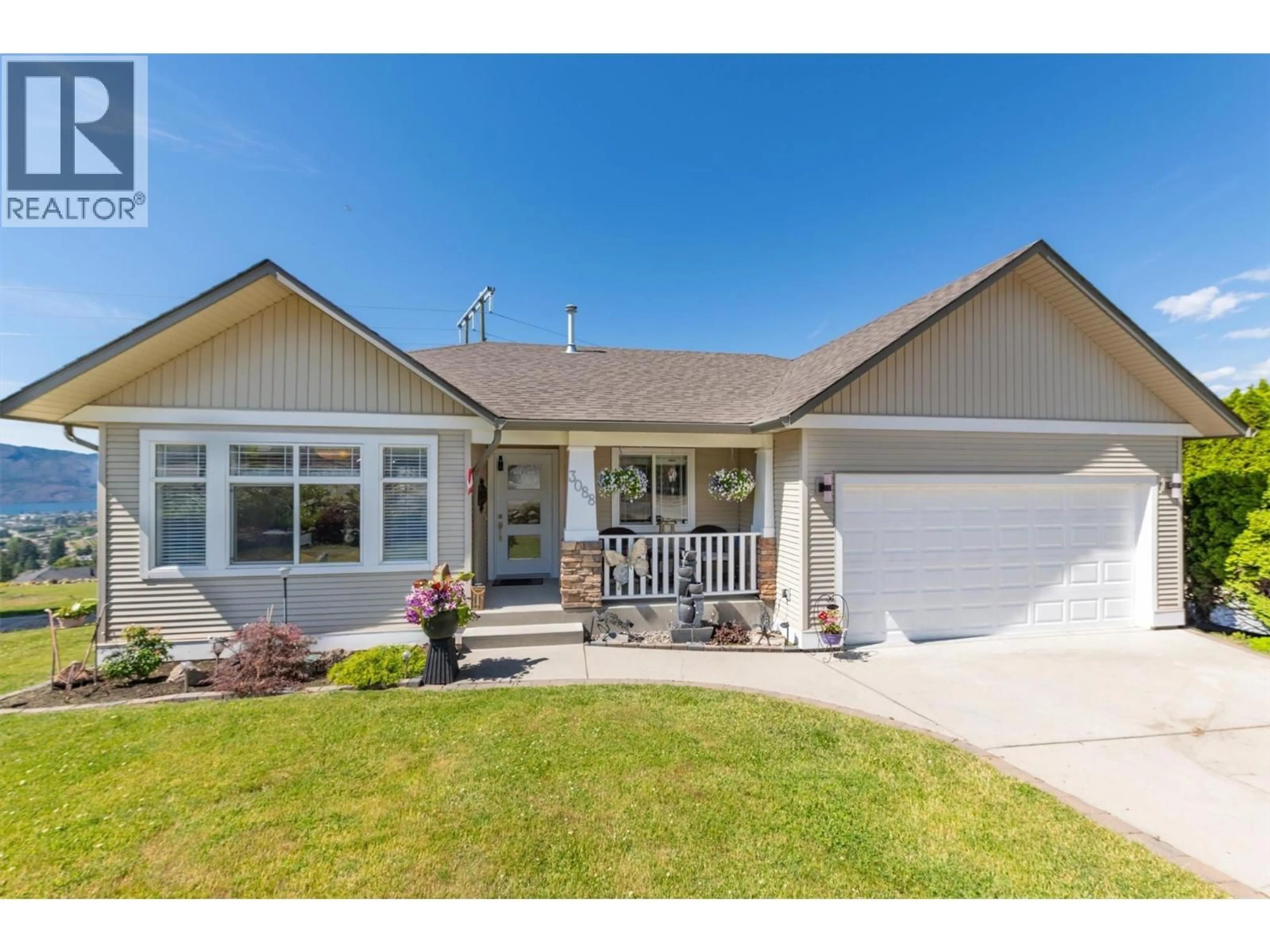 Home with vinyl exterior material, street for 3088 SAGEVIEW ROAD, West Kelowna British Columbia V4T2Y5