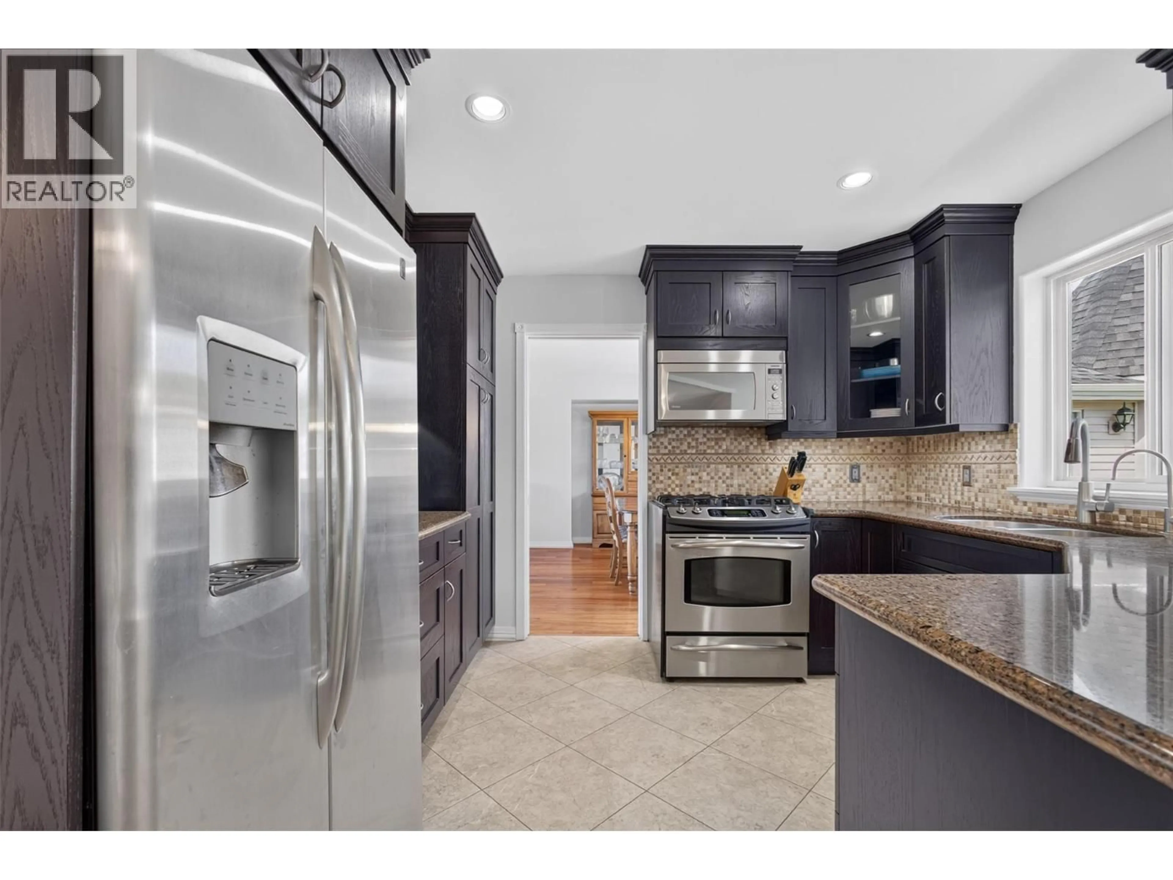 Open concept kitchen, ceramic/tile floor for 3604 LEVER COURT, Peachland British Columbia V0H1X2