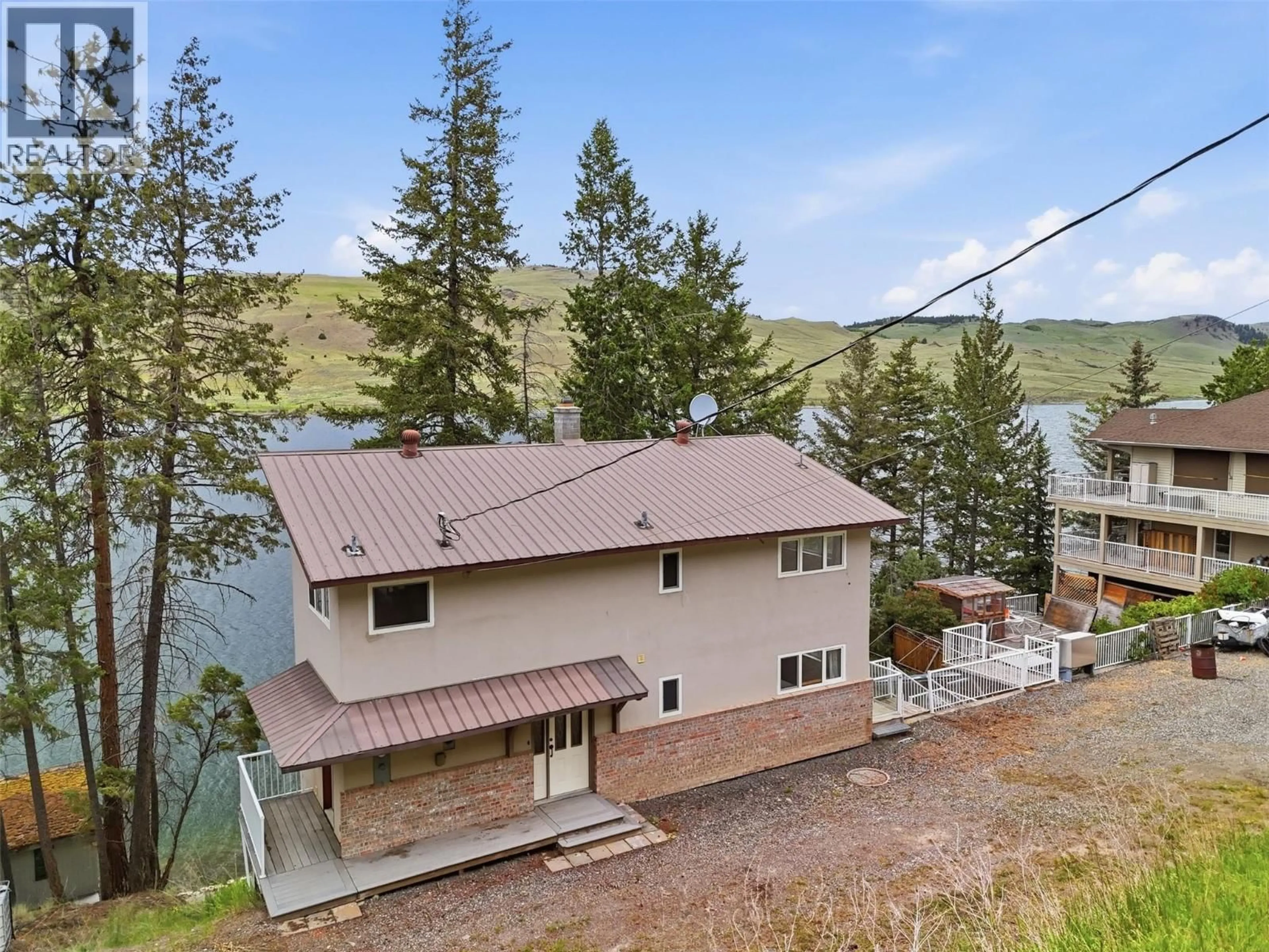 A pic from outside/outdoor area/front of a property/back of a property/a pic from drone, water/lake/river/ocean view for 9067 PLANET MINE ROAD, Stump Lake British Columbia V0E1S0