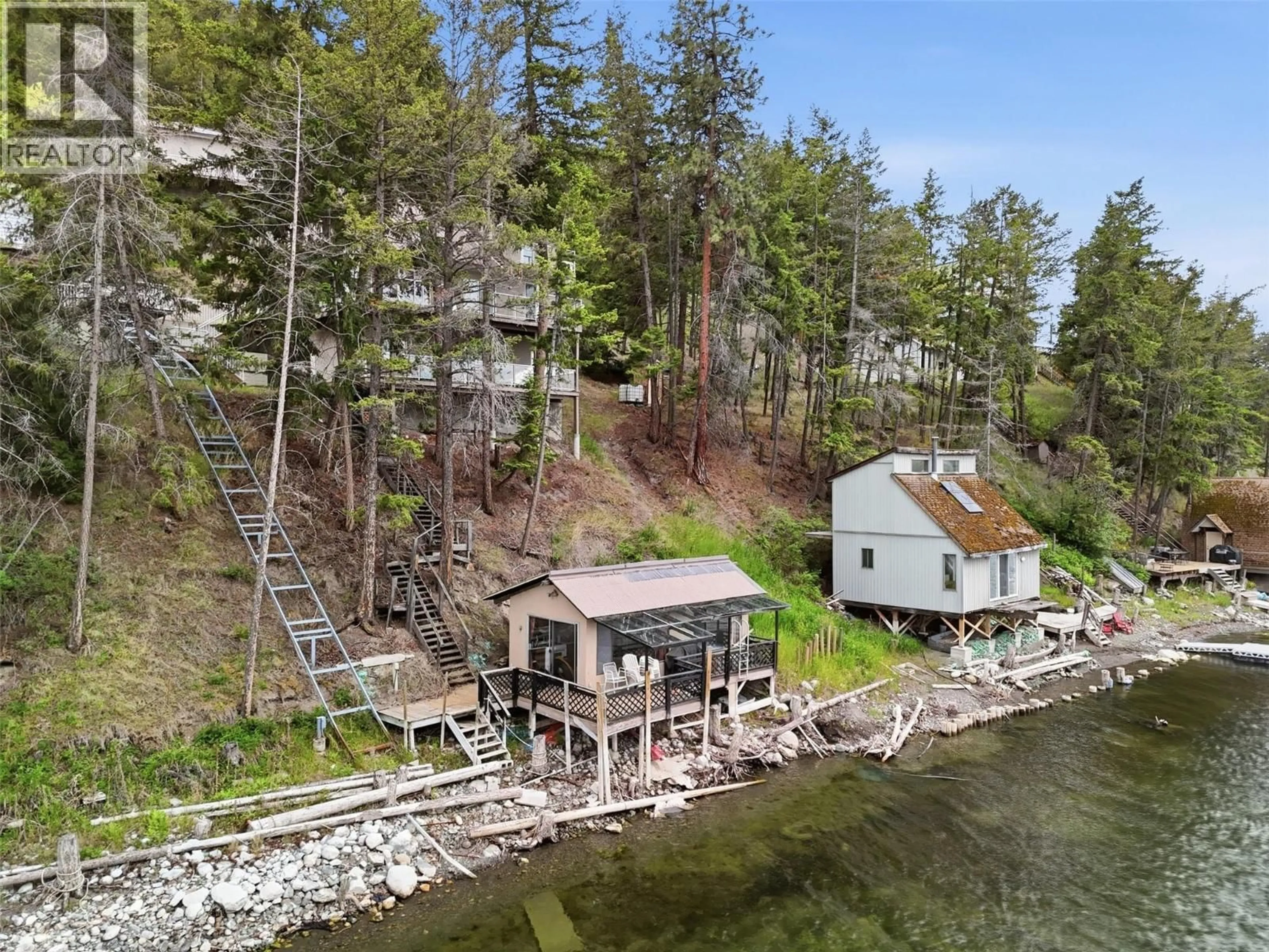 A pic from outside/outdoor area/front of a property/back of a property/a pic from drone, water/lake/river/ocean view for 9067 PLANET MINE ROAD, Stump Lake British Columbia V0E1S0