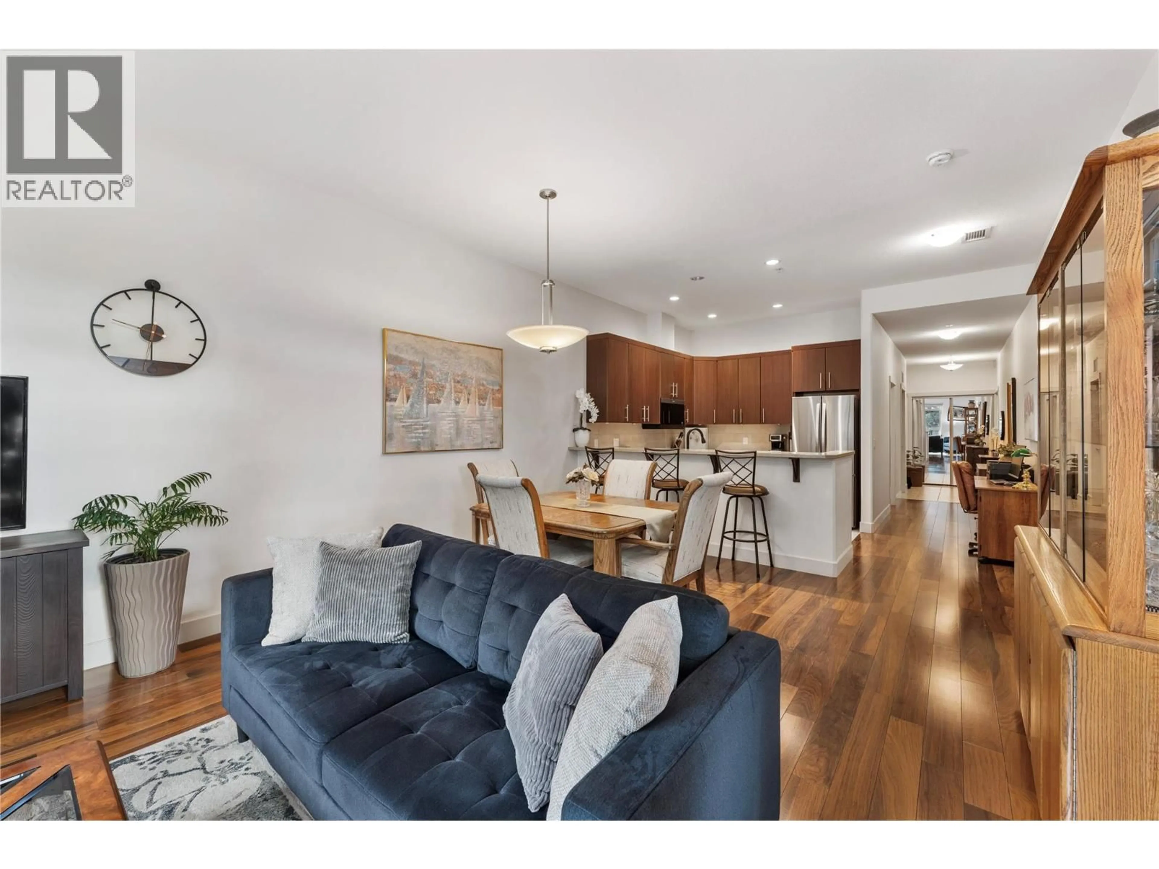 Open concept kitchen, wood/laminate floor for 103 - 457 WEST AVENUE, Kelowna British Columbia V1Y4Z3