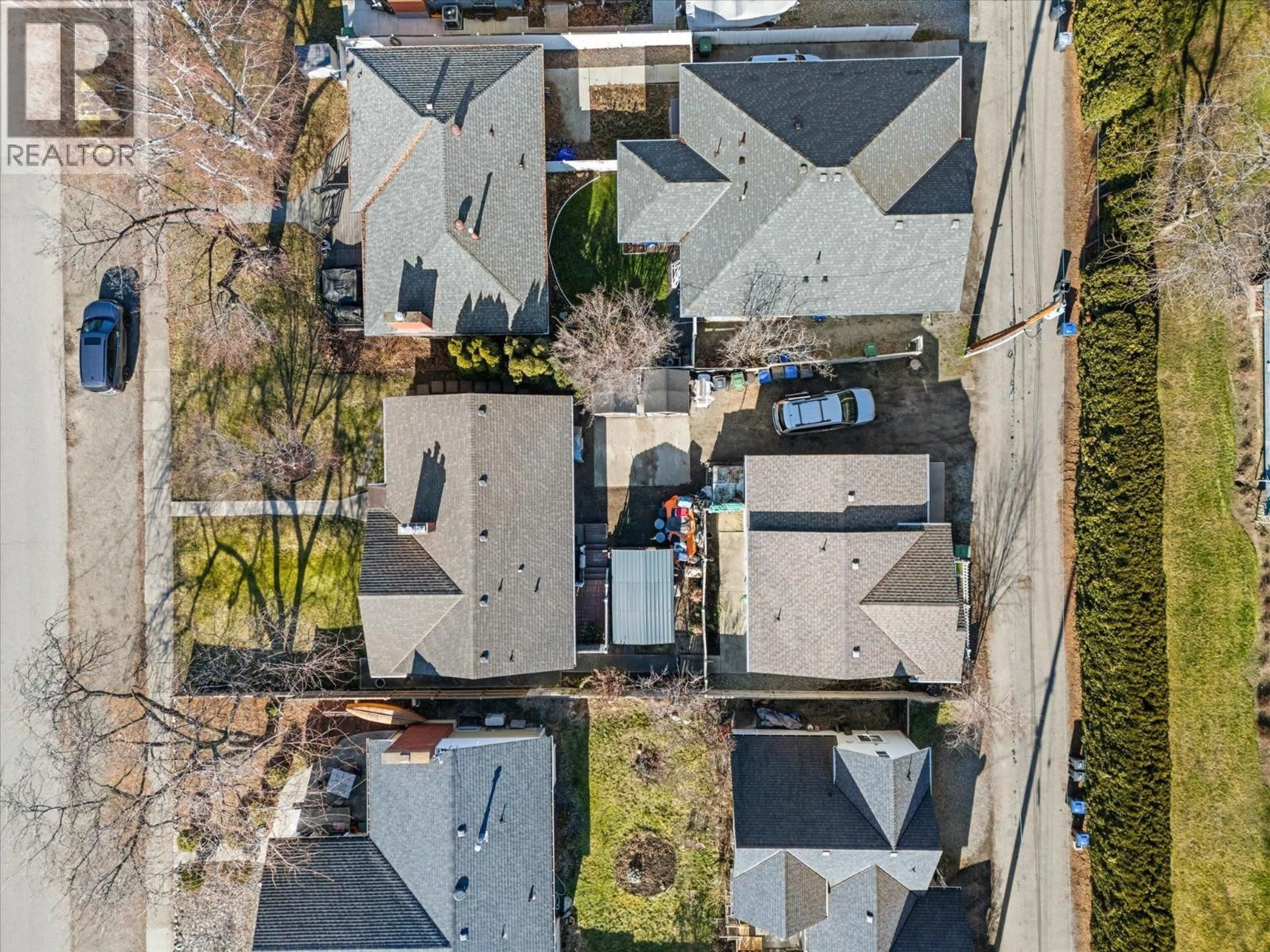 A pic from outside/outdoor area/front of a property/back of a property/a pic from drone, street for 1945/1947 BOWES STREET, Kelowna British Columbia V1Y3C2