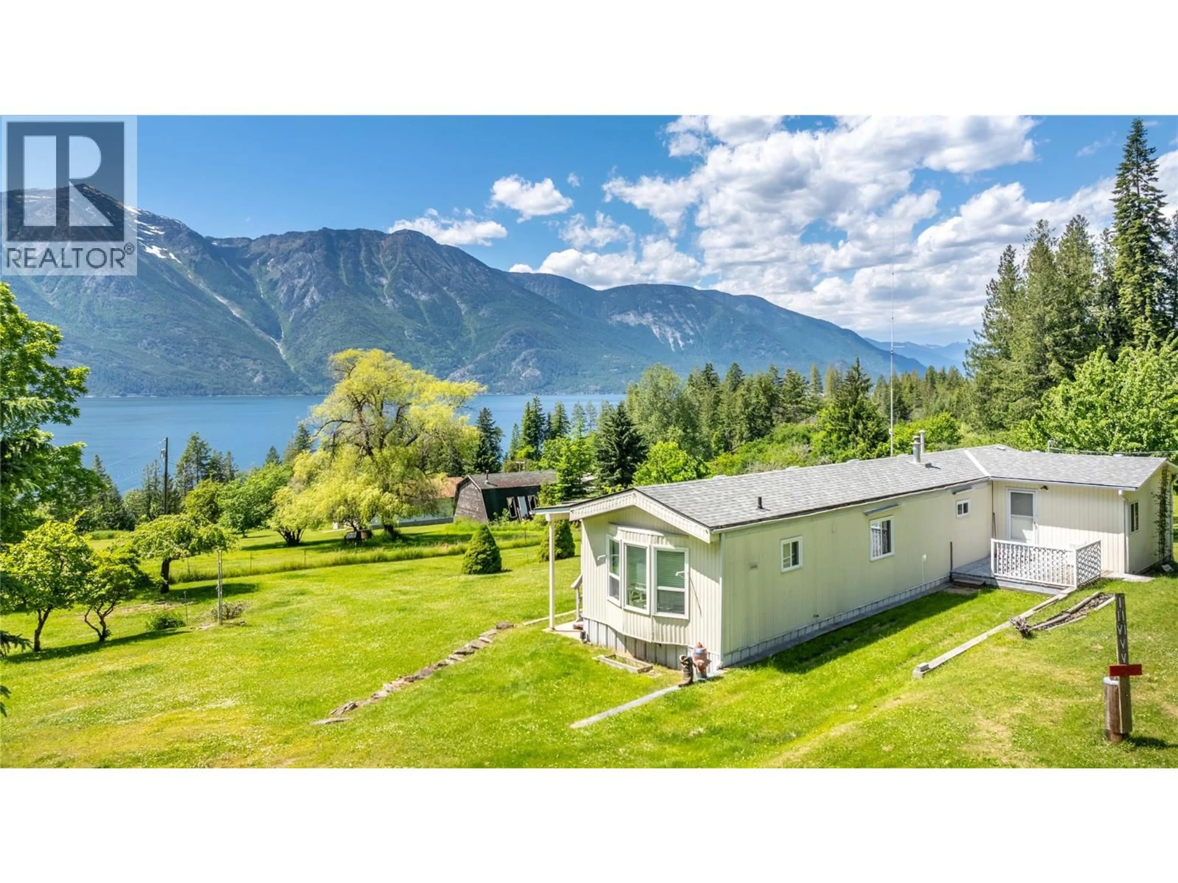 A pic from outside/outdoor area/front of a property/back of a property/a pic from drone, water/lake/river/ocean view for 12655 HEPHER ROAD, Boswell British Columbia V0B1A4