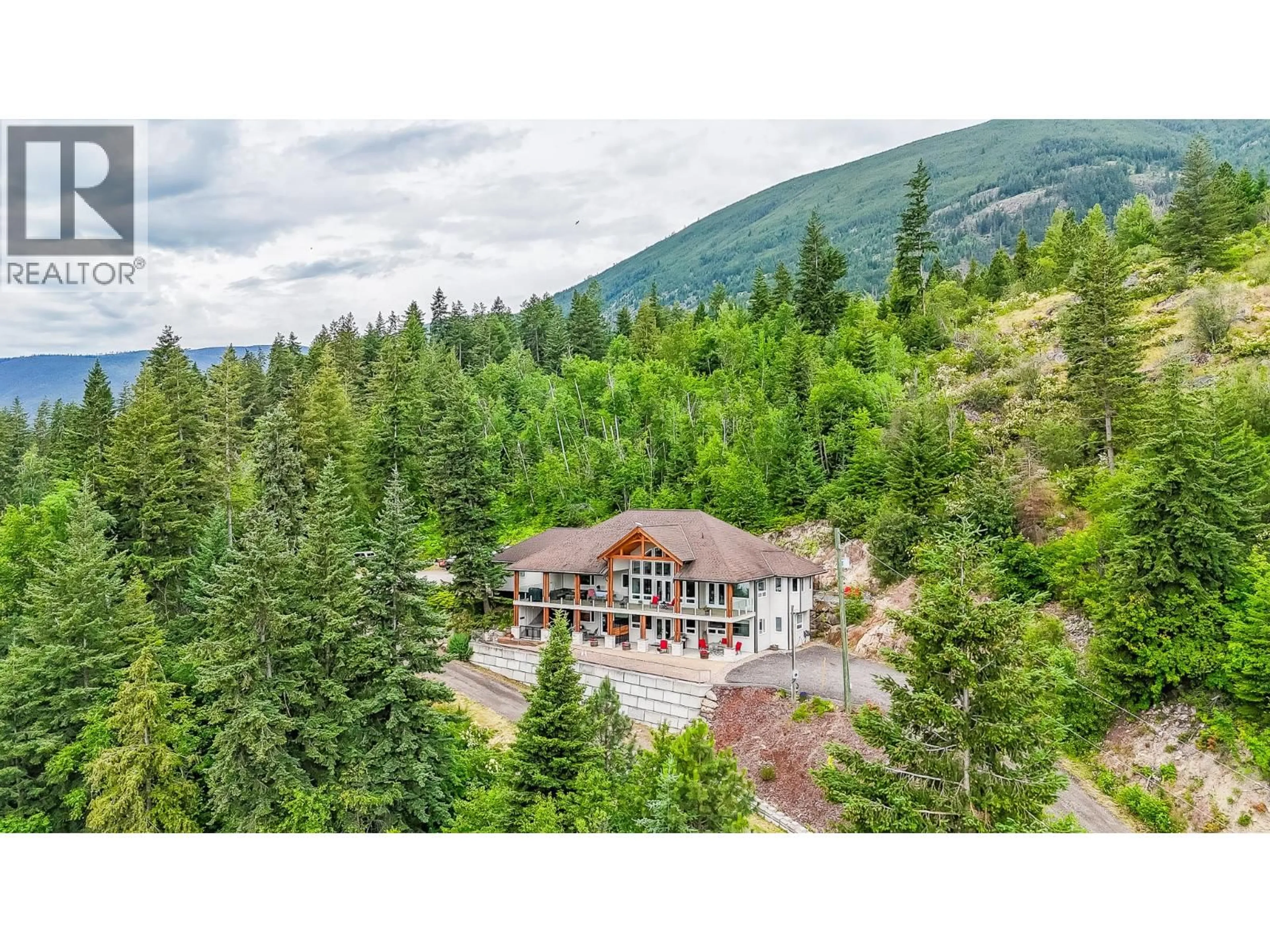 A pic from outside/outdoor area/front of a property/back of a property/a pic from drone, mountain view for 5694 TRANS CANADA HIGHWAY NORTHWEST, Salmon Arm British Columbia V1E3A2