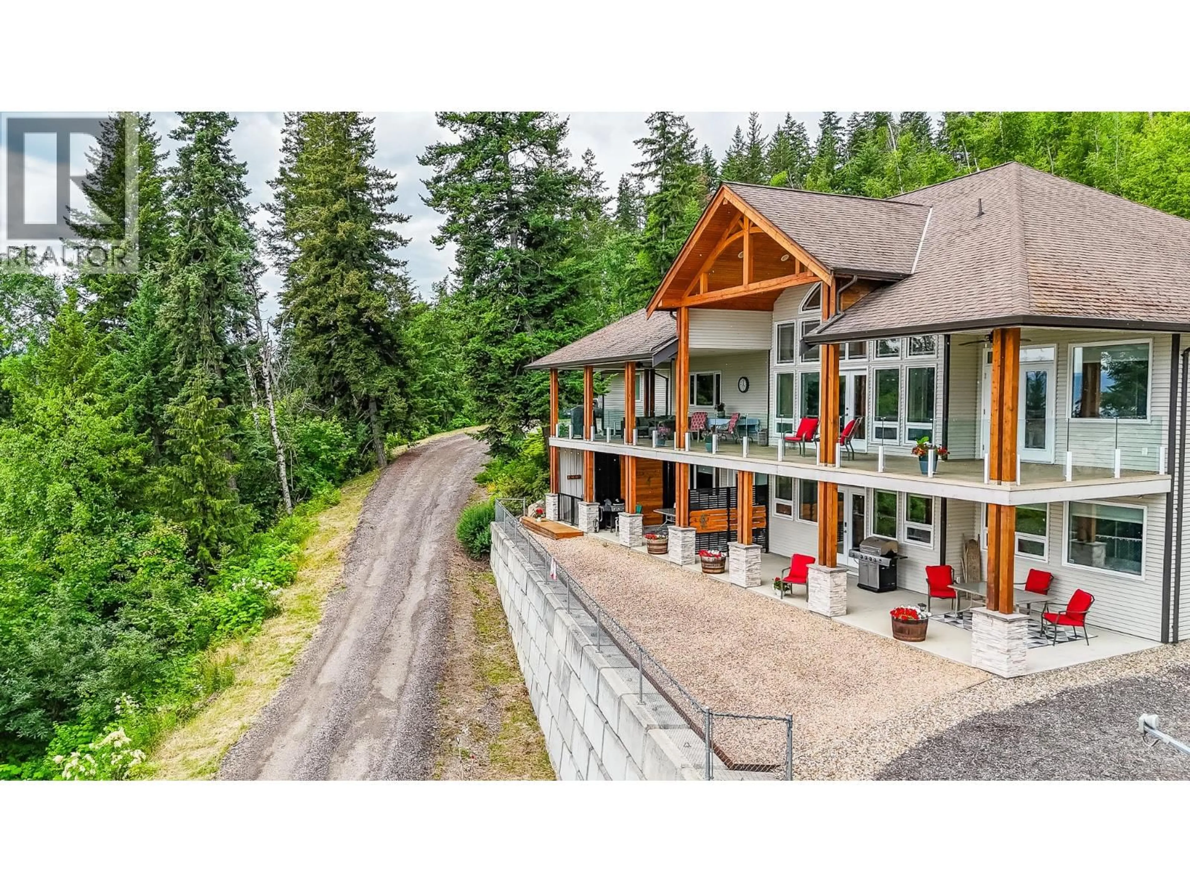 A pic from outside/outdoor area/front of a property/back of a property/a pic from drone, mountain view for 5694 TRANS CANADA HIGHWAY NORTHWEST, Salmon Arm British Columbia V1E3A2