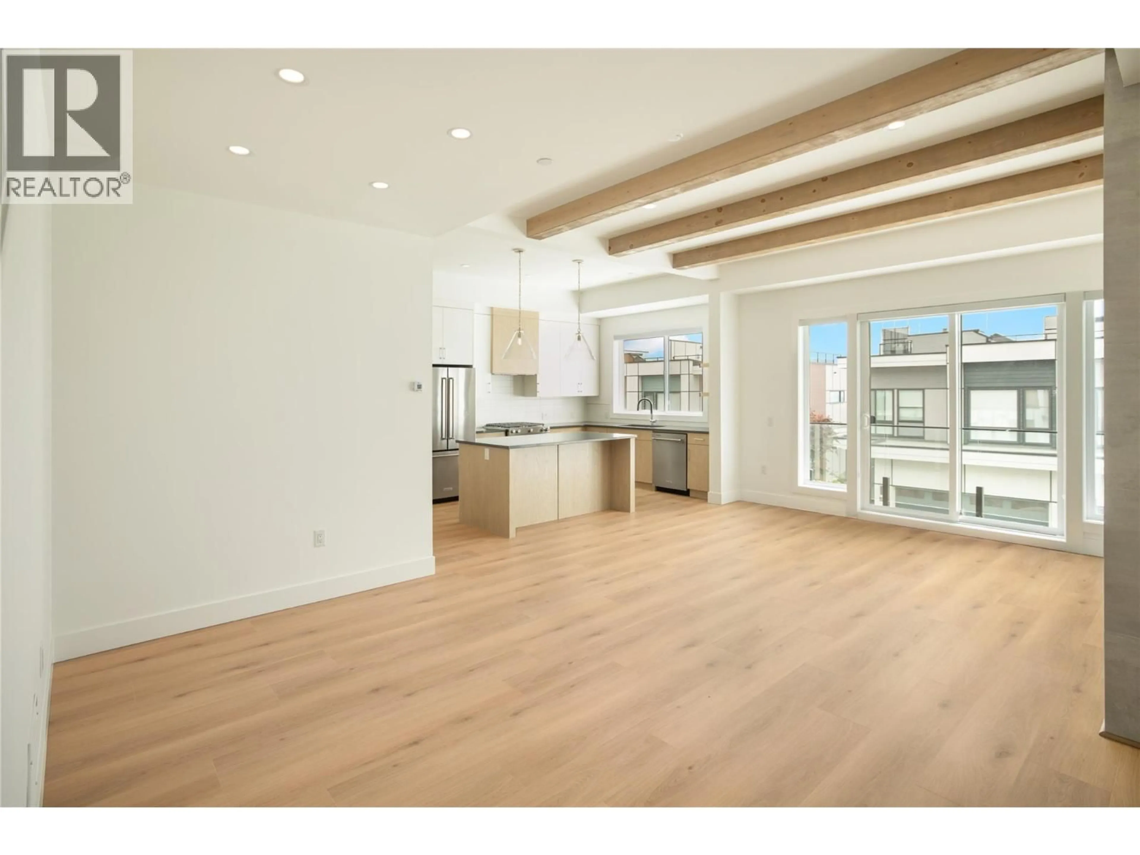 Open concept kitchen, wood/laminate floor for 160 - 2100 CAMPBELL PLACE, West Kelowna British Columbia V1Z1S9
