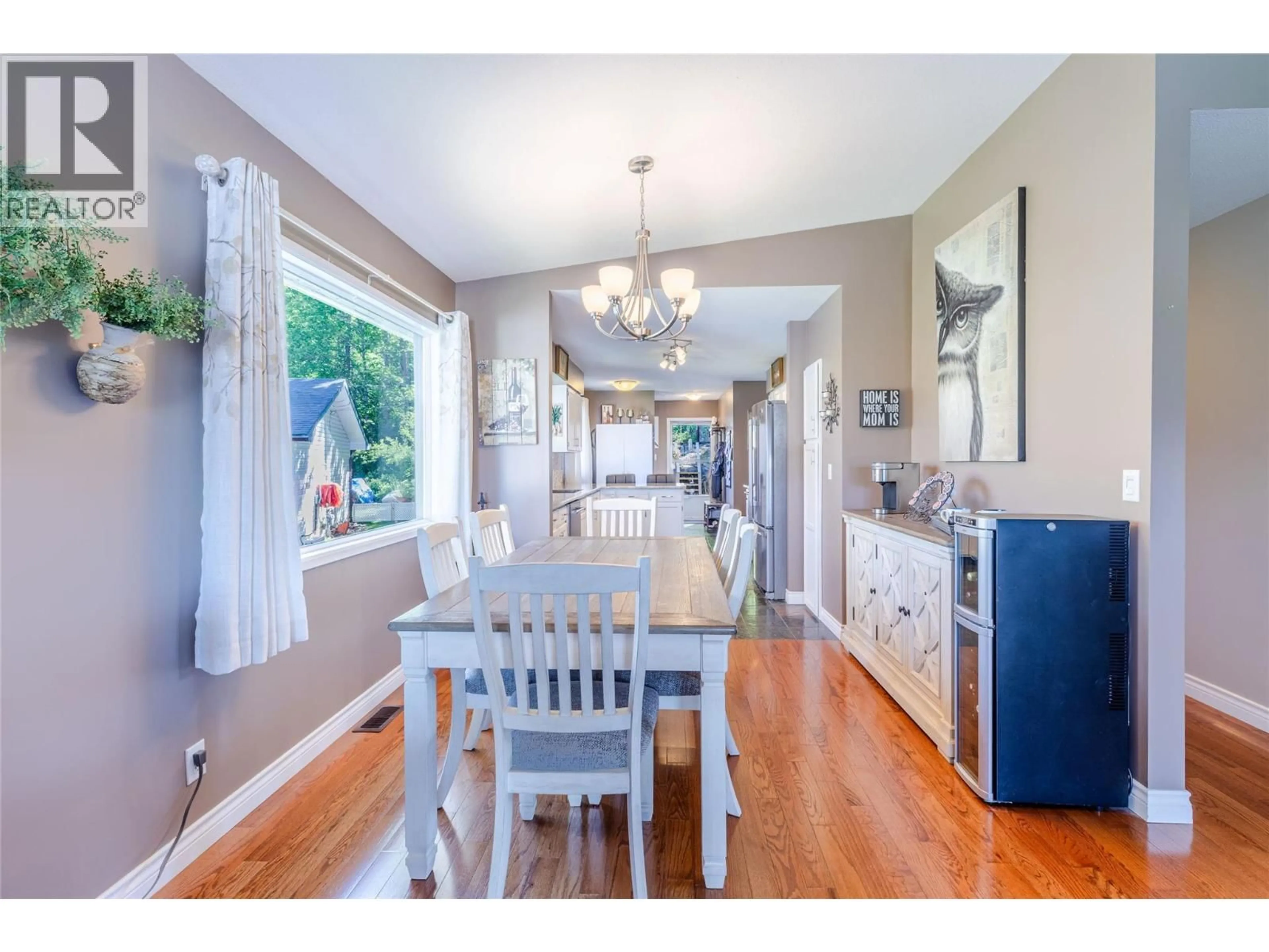 Dining room, wood/laminate floor for 402 20TH AVENUE NORTH, Creston British Columbia V0B1G5