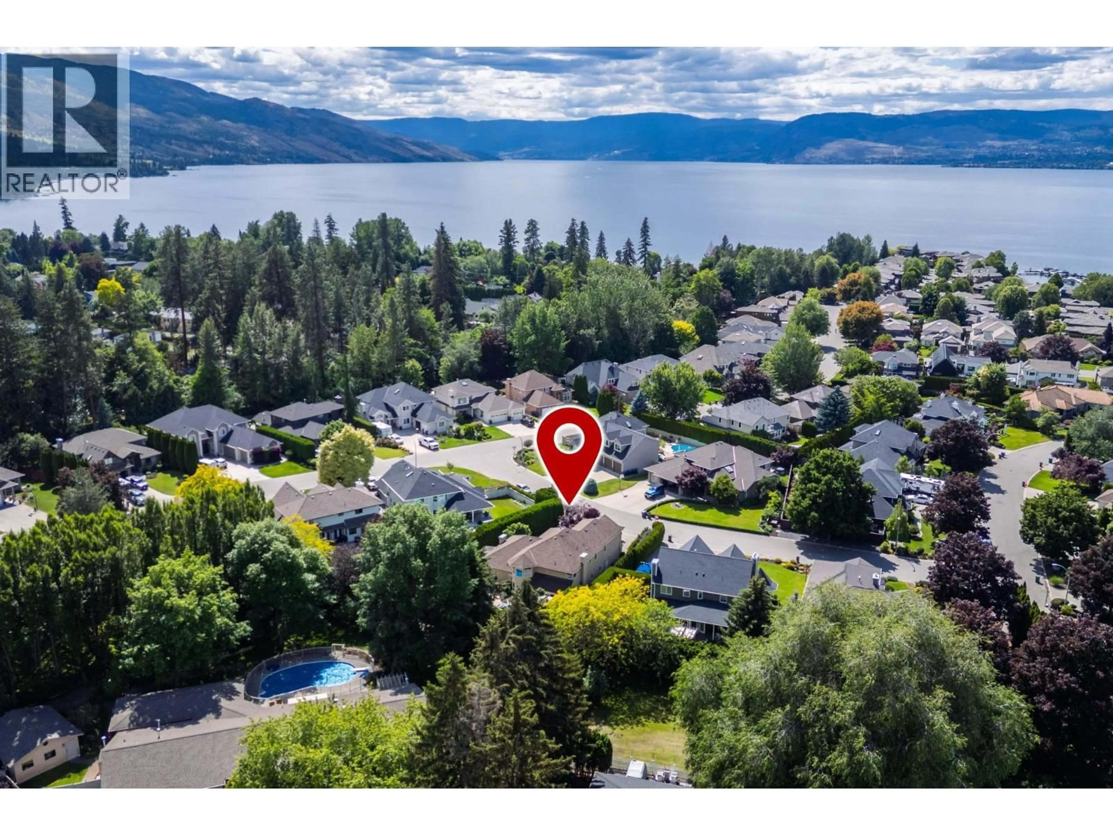 A pic from outside/outdoor area/front of a property/back of a property/a pic from drone, water/lake/river/ocean view for 492 CARONA CRESCENT, Kelowna British Columbia V1W3C6