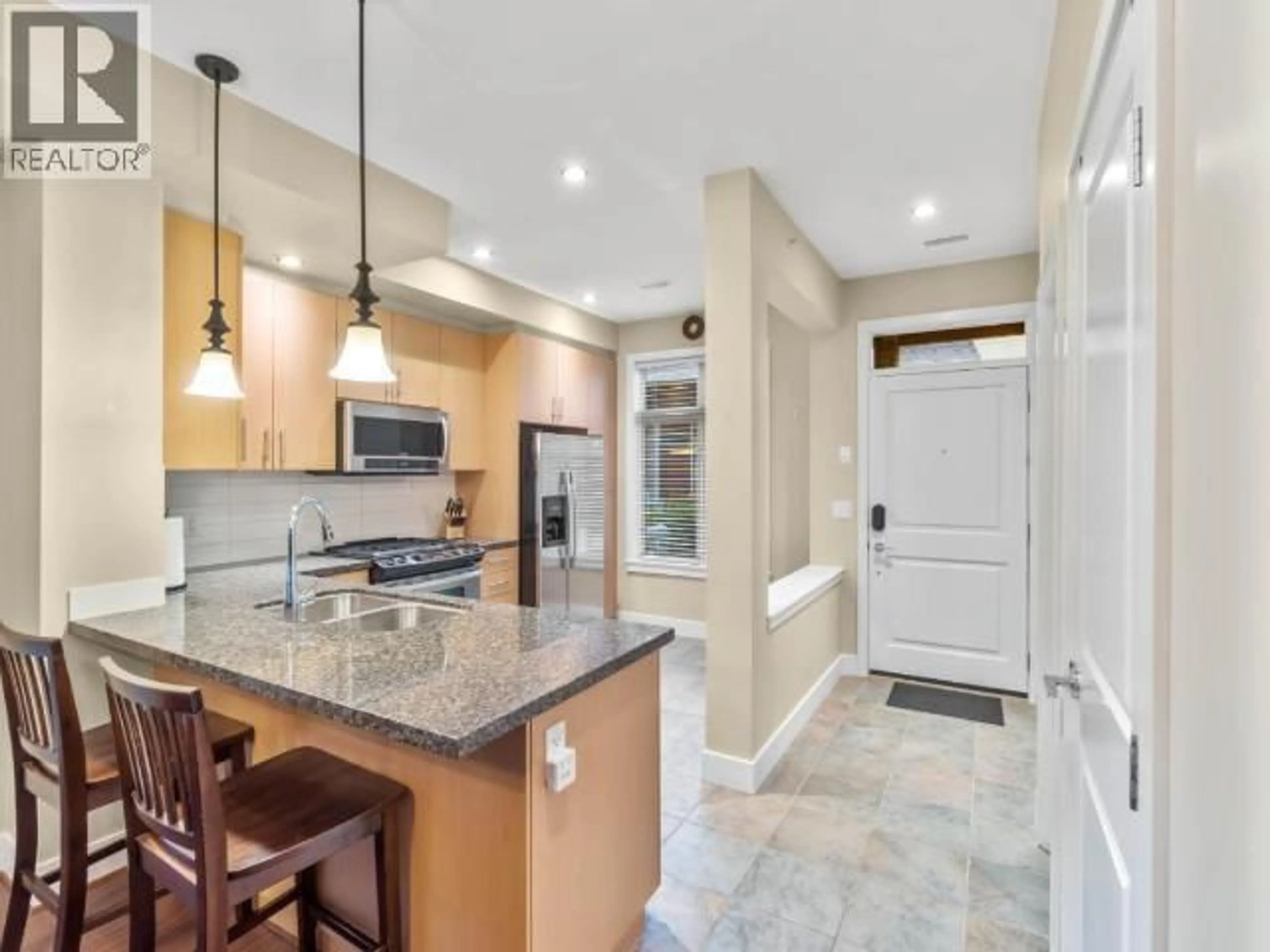 Open concept kitchen, ceramic/tile floor for 39 - 130 COLEBROOK ROAD, Kamloops British Columbia V1S0B4