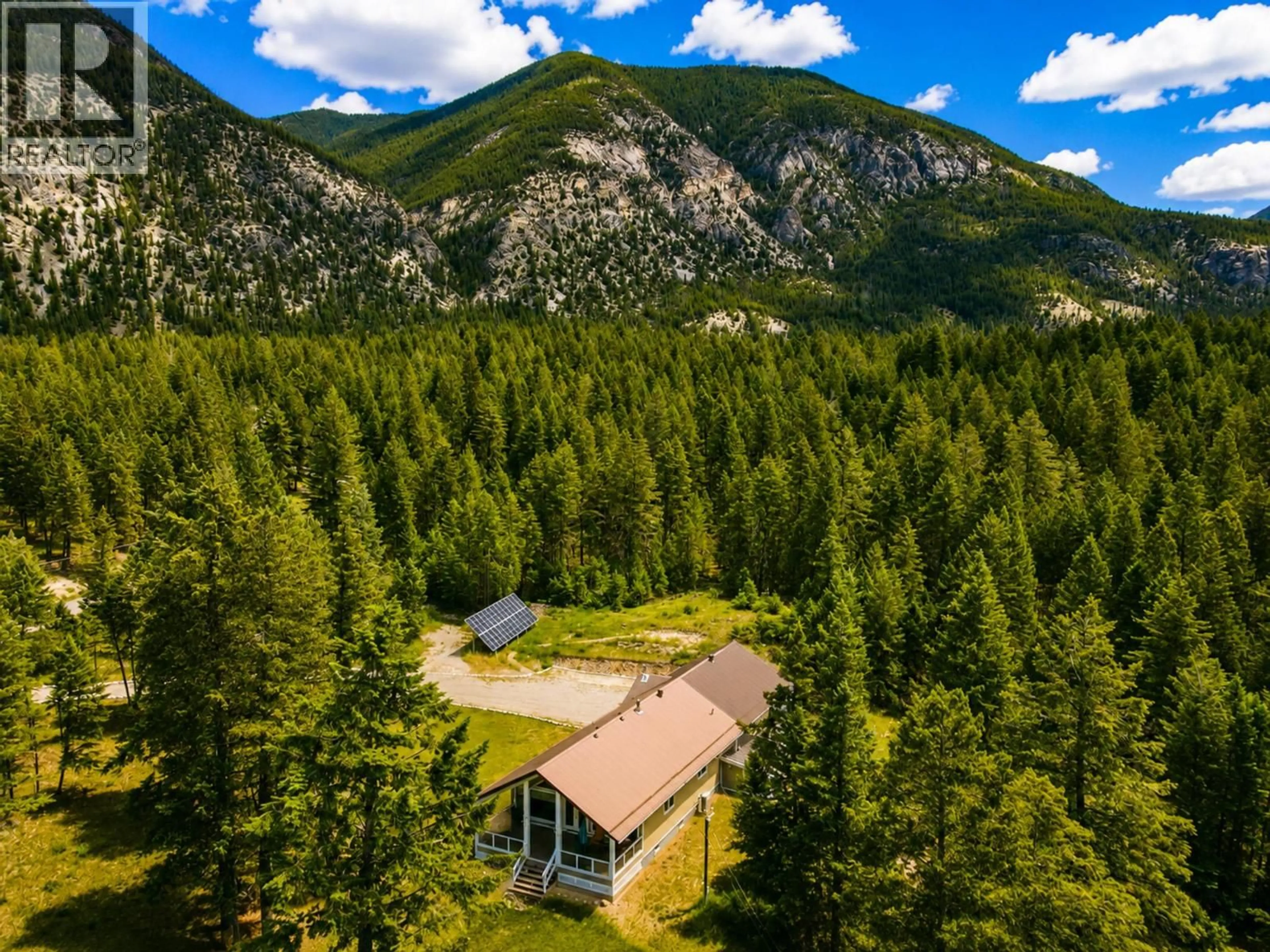 A pic from outside/outdoor area/front of a property/back of a property/a pic from drone, mountain view for 5226 JUNIPER HEIGHTS ROAD, Invermere British Columbia V0A1K2