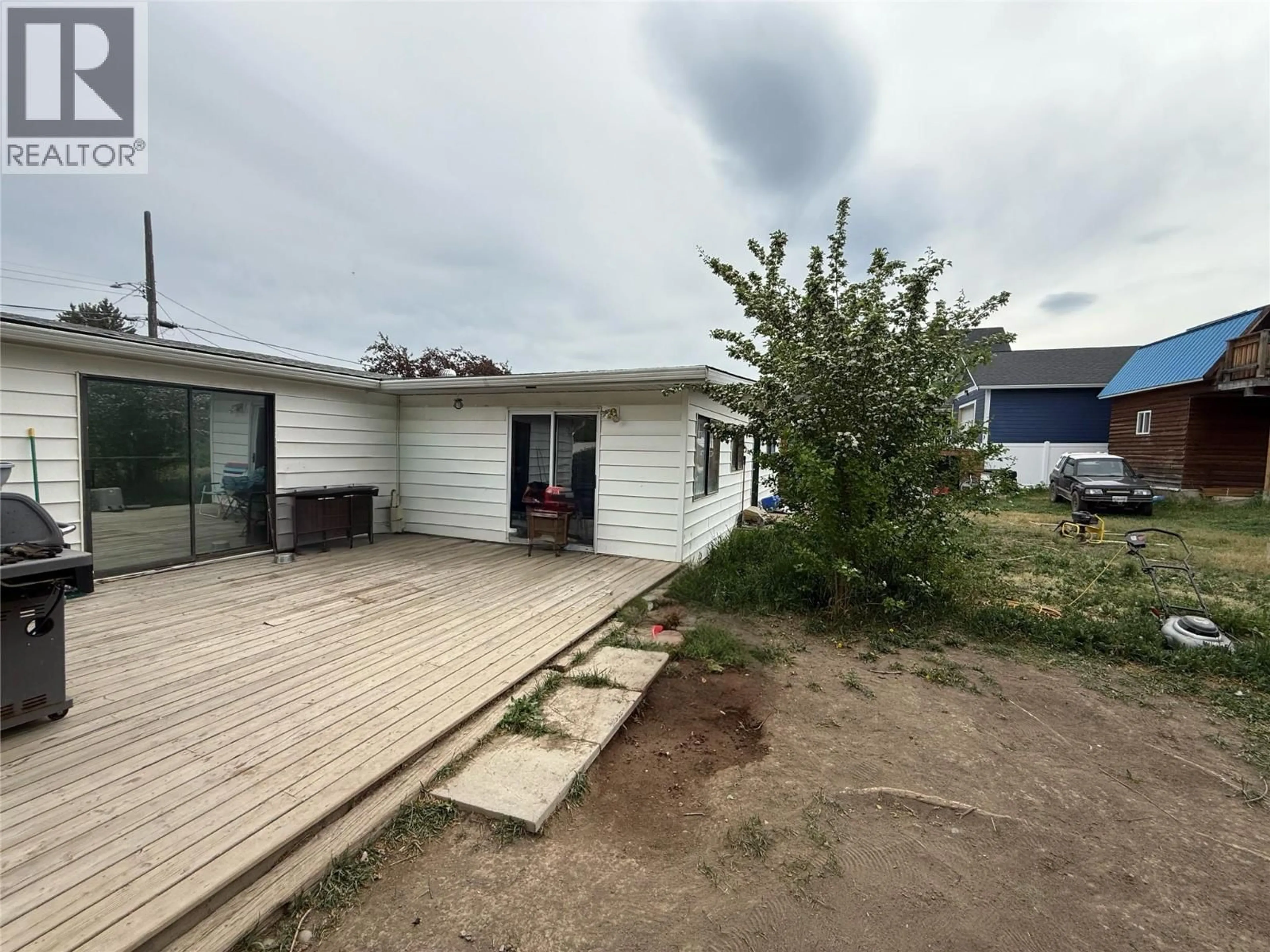 A pic from outside/outdoor area/front of a property/back of a property/a pic from drone, building for 1417 FIR AVENUE, Merritt British Columbia V1K1L1