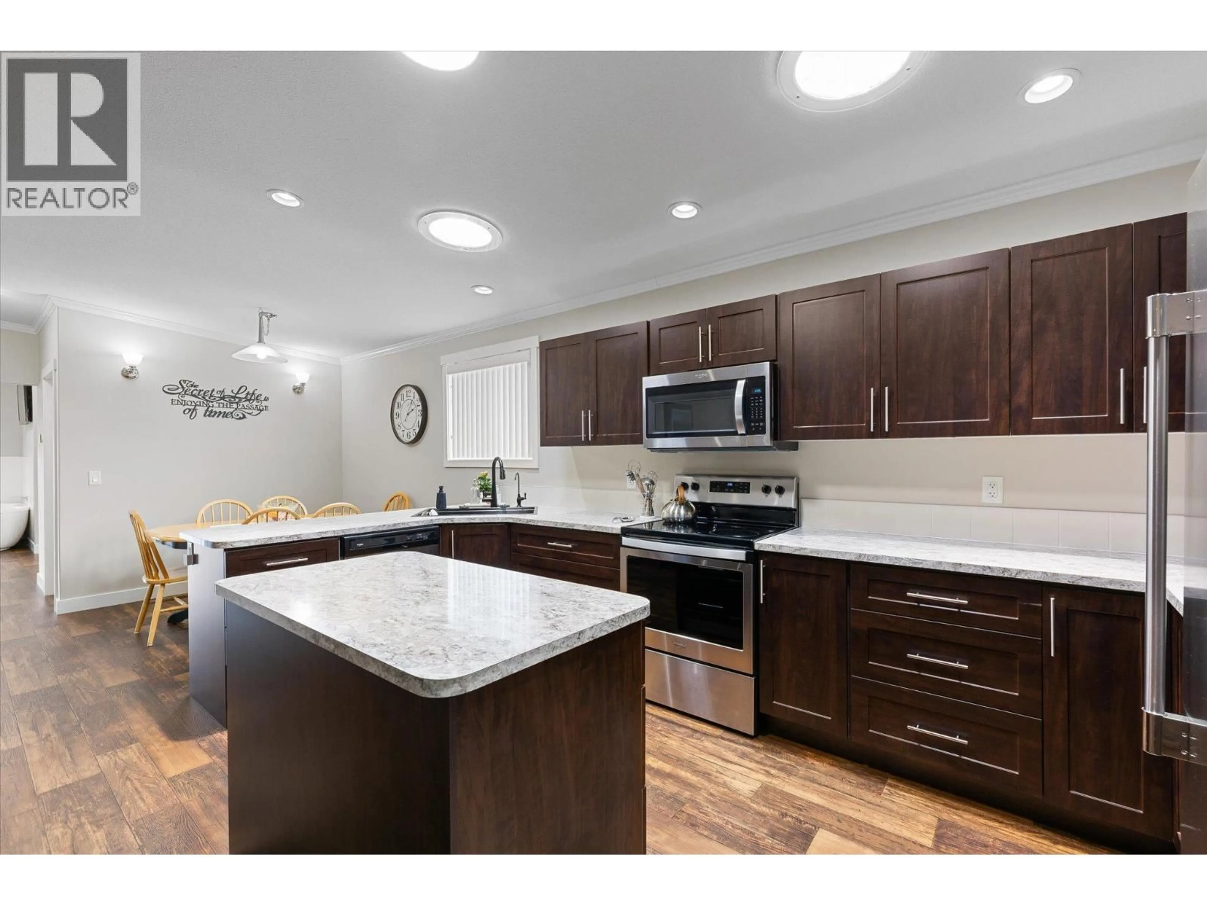 Open concept kitchen, unknown for 402 - 3591 OLD VERNON ROAD, Kelowna British Columbia V1X6P4