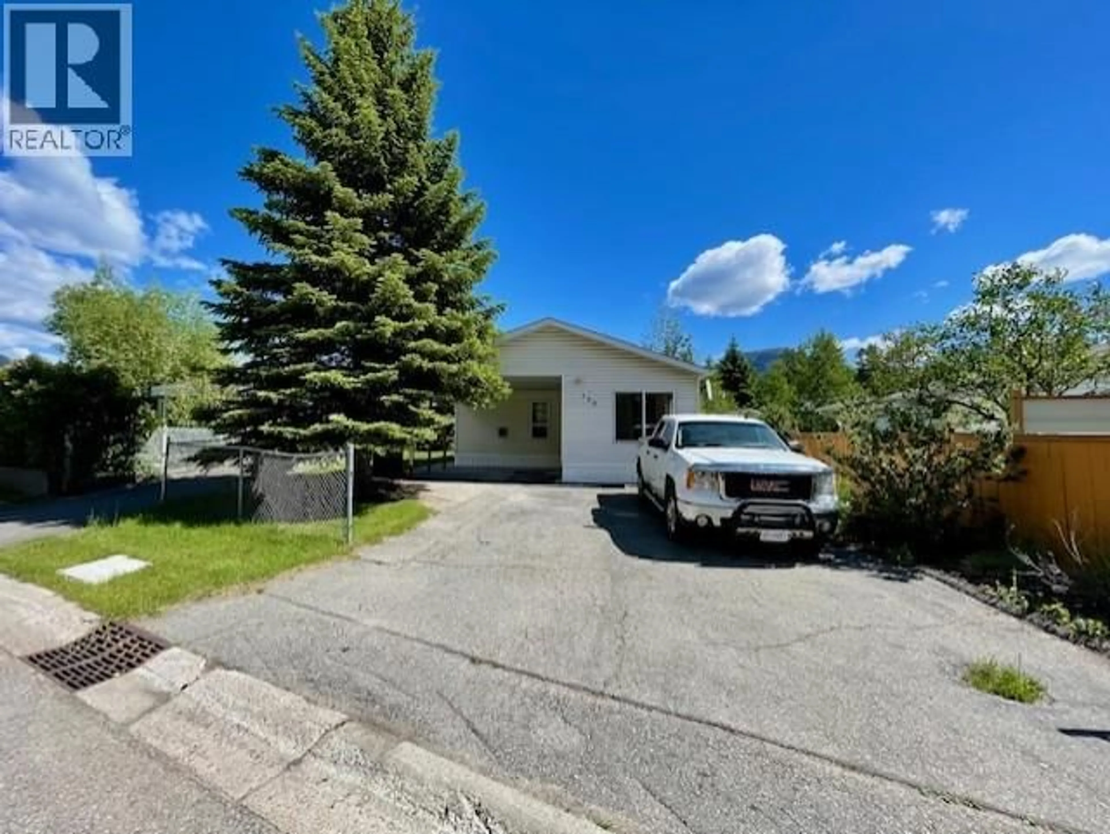 A pic from outside/outdoor area/front of a property/back of a property/a pic from drone, street for 388 RED CEDAR CRESCENT, Sparwood British Columbia V0B2G0