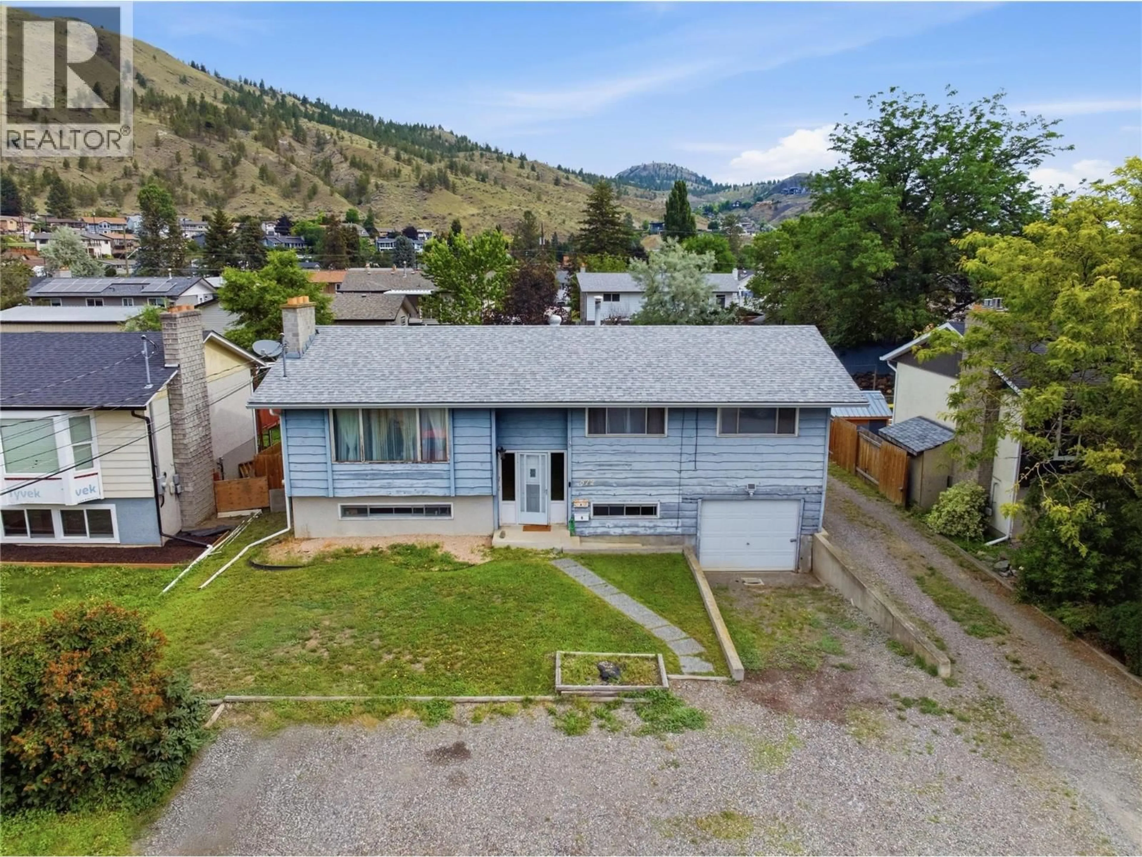 A pic from outside/outdoor area/front of a property/back of a property/a pic from drone, mountain view for 872 PUHALLO DRIVE, Kamloops British Columbia V2B6P7
