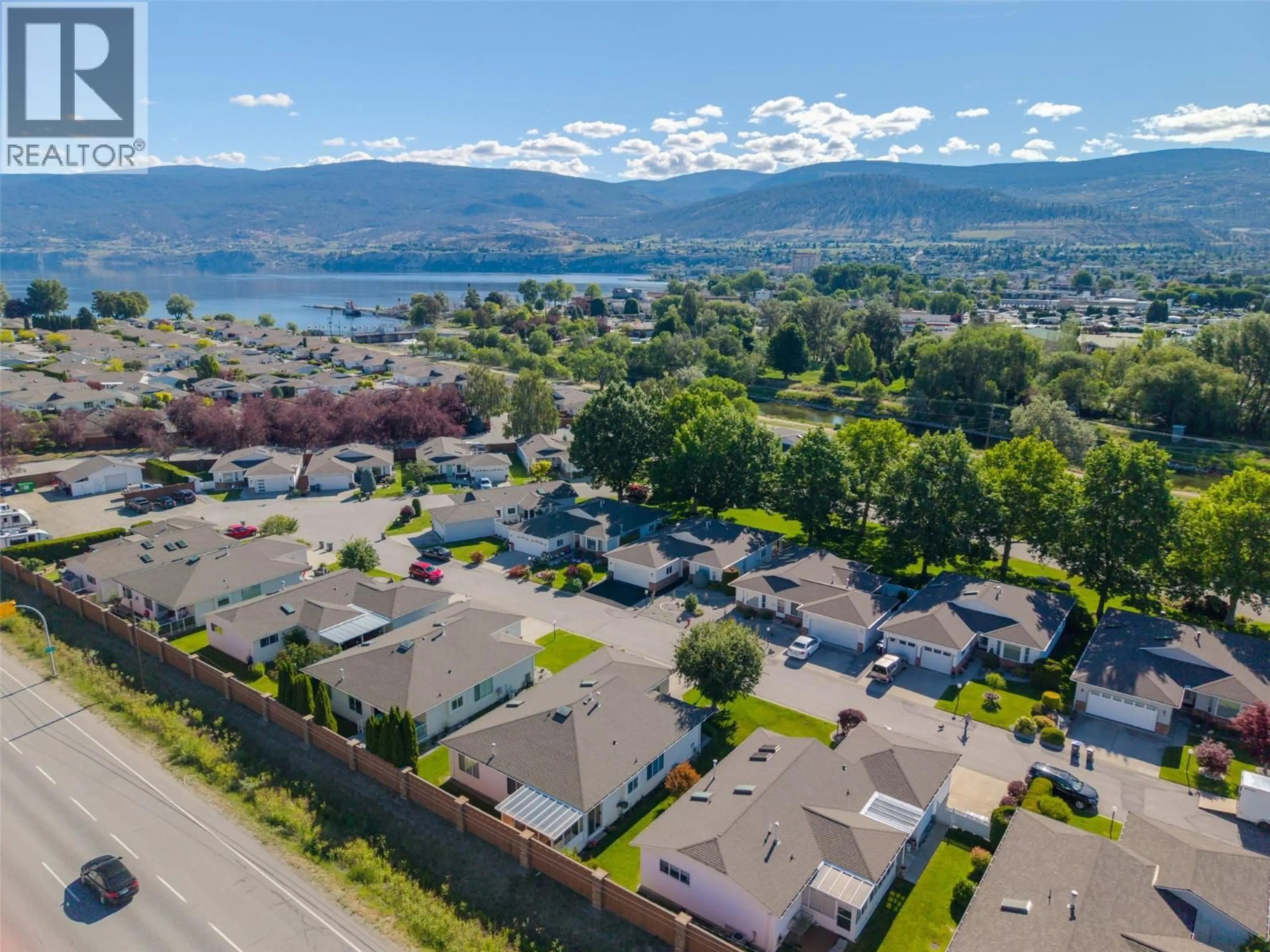 A pic from outside/outdoor area/front of a property/back of a property/a pic from drone, mountain view for 331 FALCON DRIVE, Penticton British Columbia V2A8K6