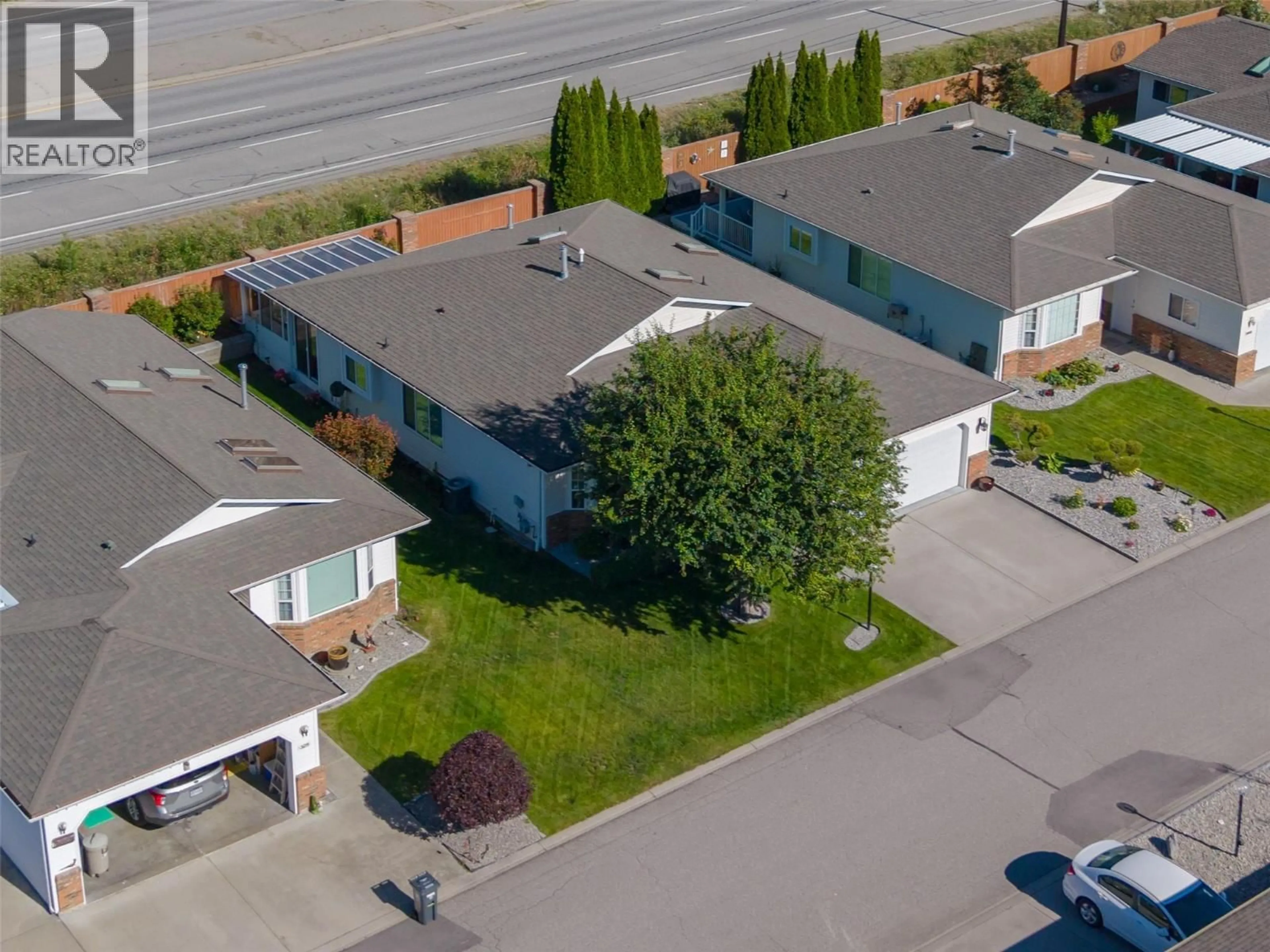 A pic from outside/outdoor area/front of a property/back of a property/a pic from drone, street for 331 FALCON DRIVE, Penticton British Columbia V2A8K6