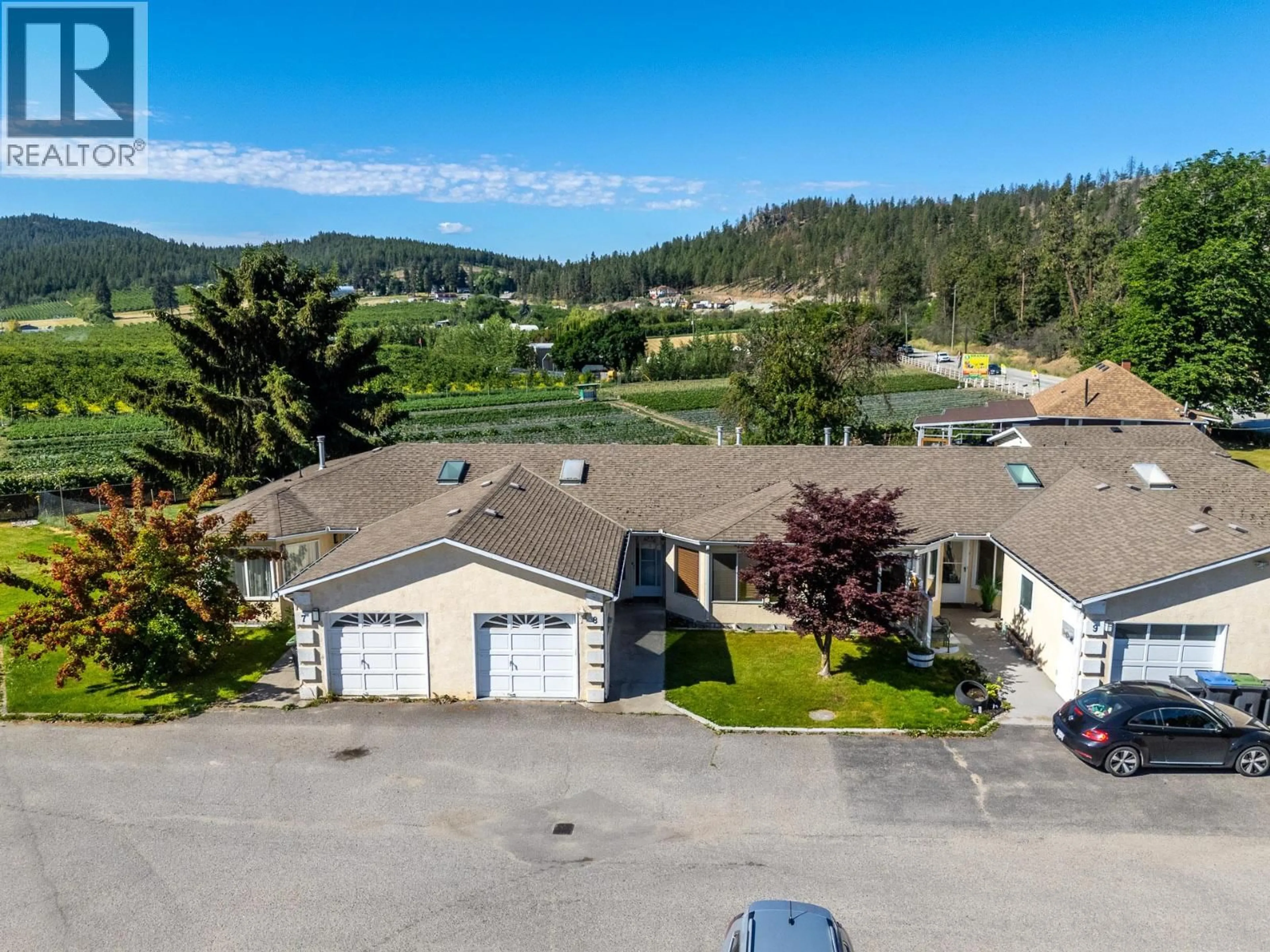 A pic from outside/outdoor area/front of a property/back of a property/a pic from drone, unknown for 8 - 9159 GLENMORE ROAD, Lake Country British Columbia V4V1R4