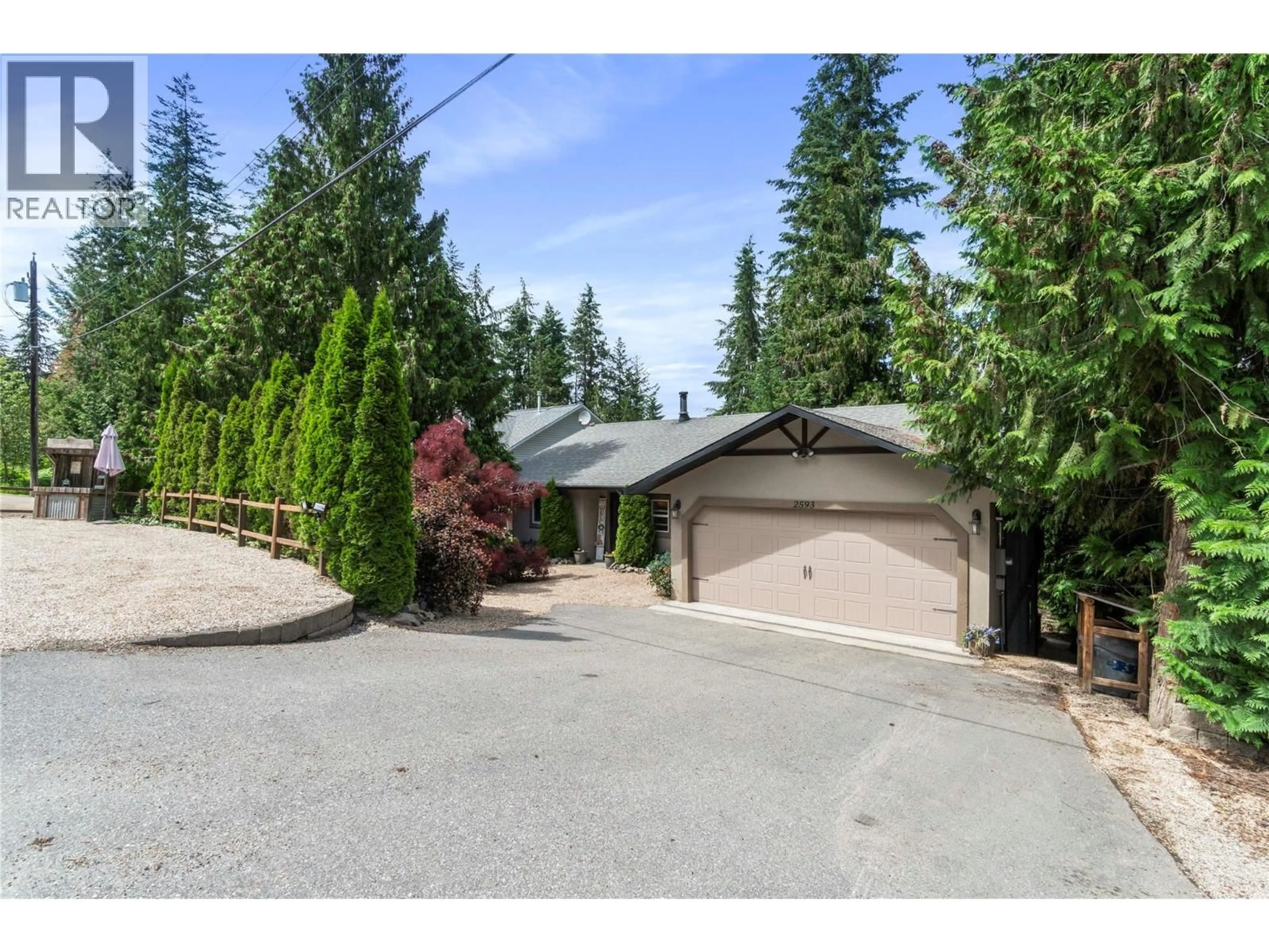 A pic from outside/outdoor area/front of a property/back of a property/a pic from drone, street for 2593 CENTENNIAL DRIVE, Blind Bay British Columbia V0E1H1