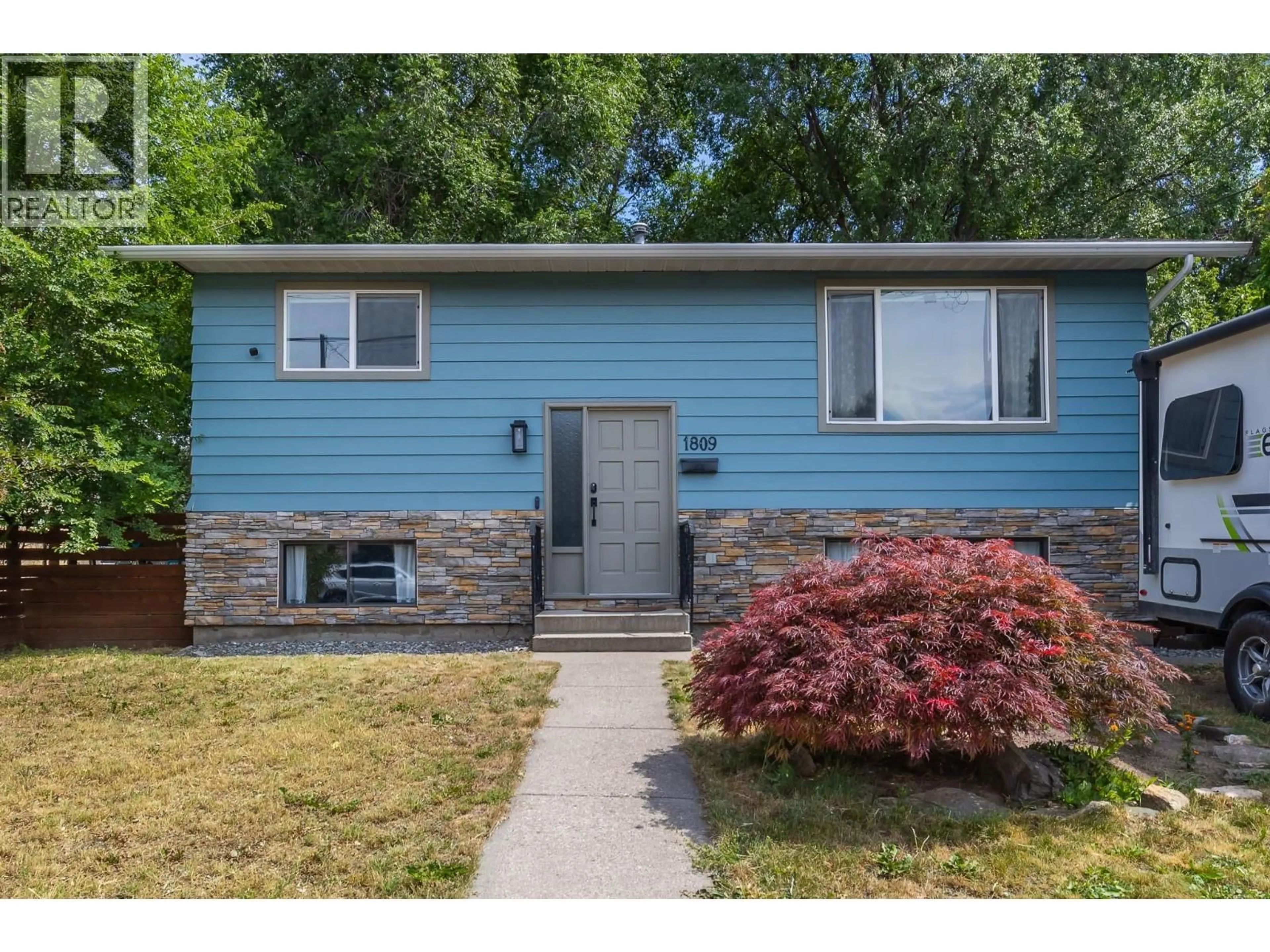 Home with vinyl exterior material, street for 1809 44 STREET, Vernon British Columbia V1T7S2