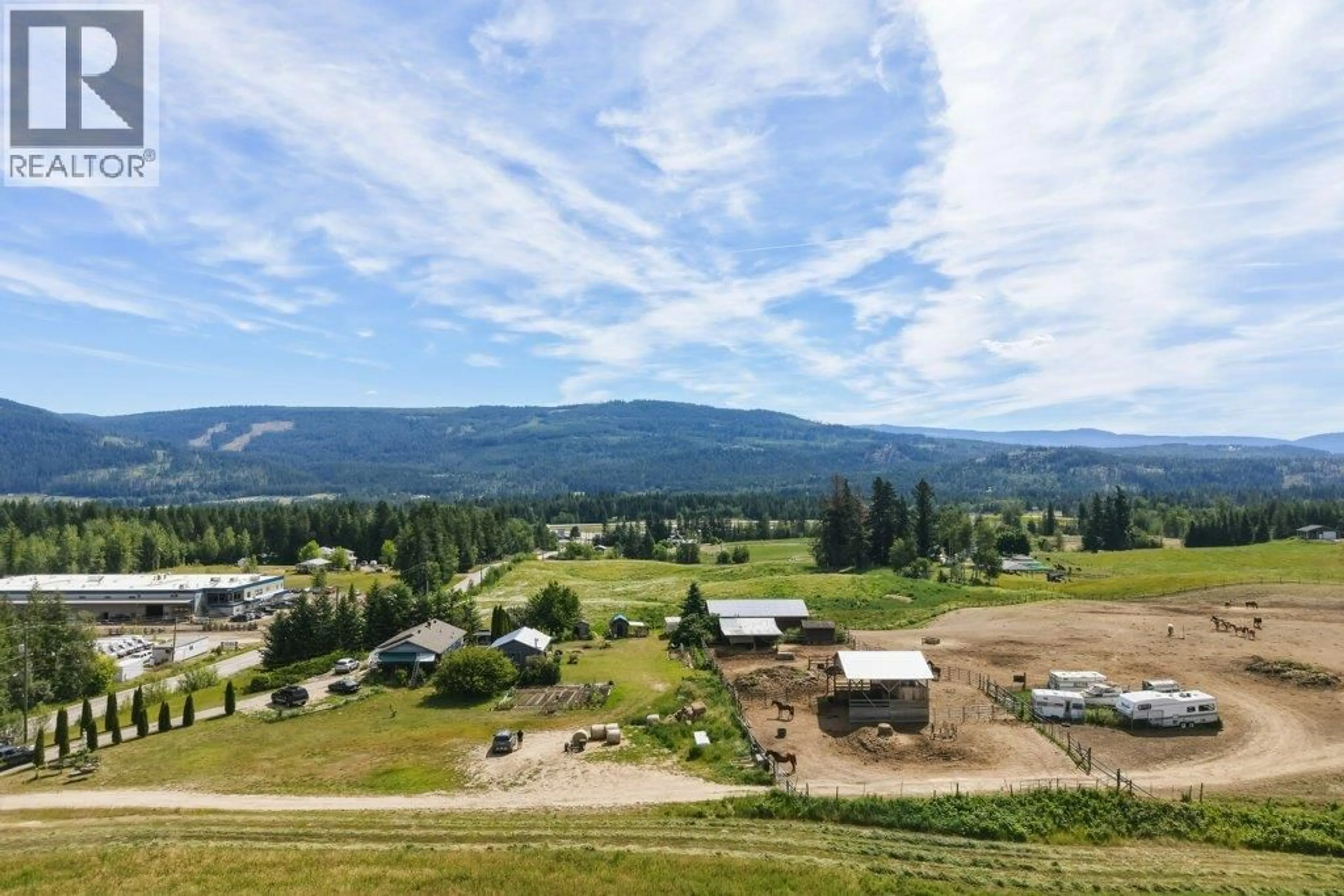 A pic from outside/outdoor area/front of a property/back of a property/a pic from drone, mountain view for 3580 20 AVENUE SOUTHEAST, Salmon Arm British Columbia V1E1X9