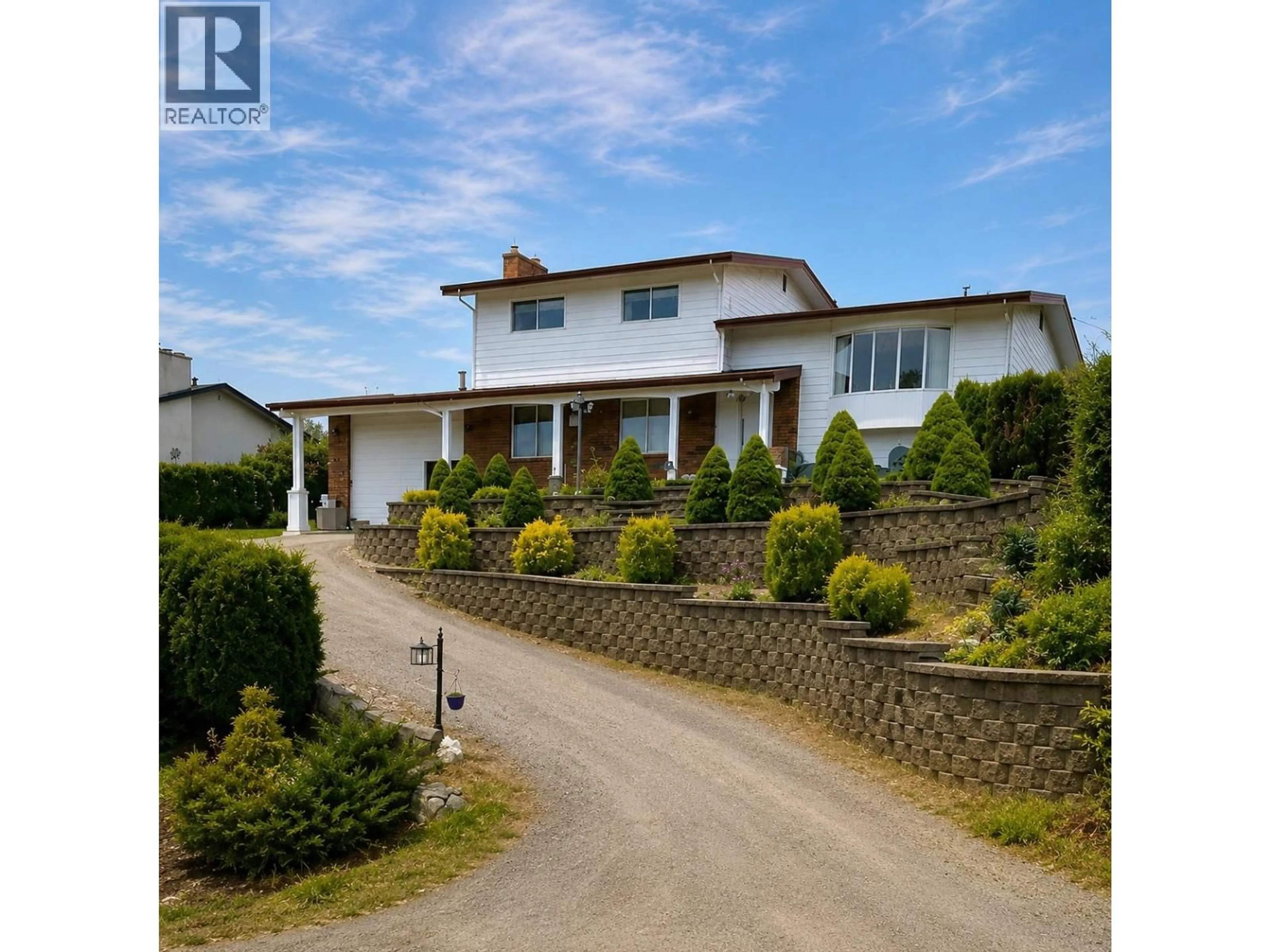 A pic from outside/outdoor area/front of a property/back of a property/a pic from drone, street for 838 MCKENZIE ROAD, Kelowna British Columbia V1X2B3
