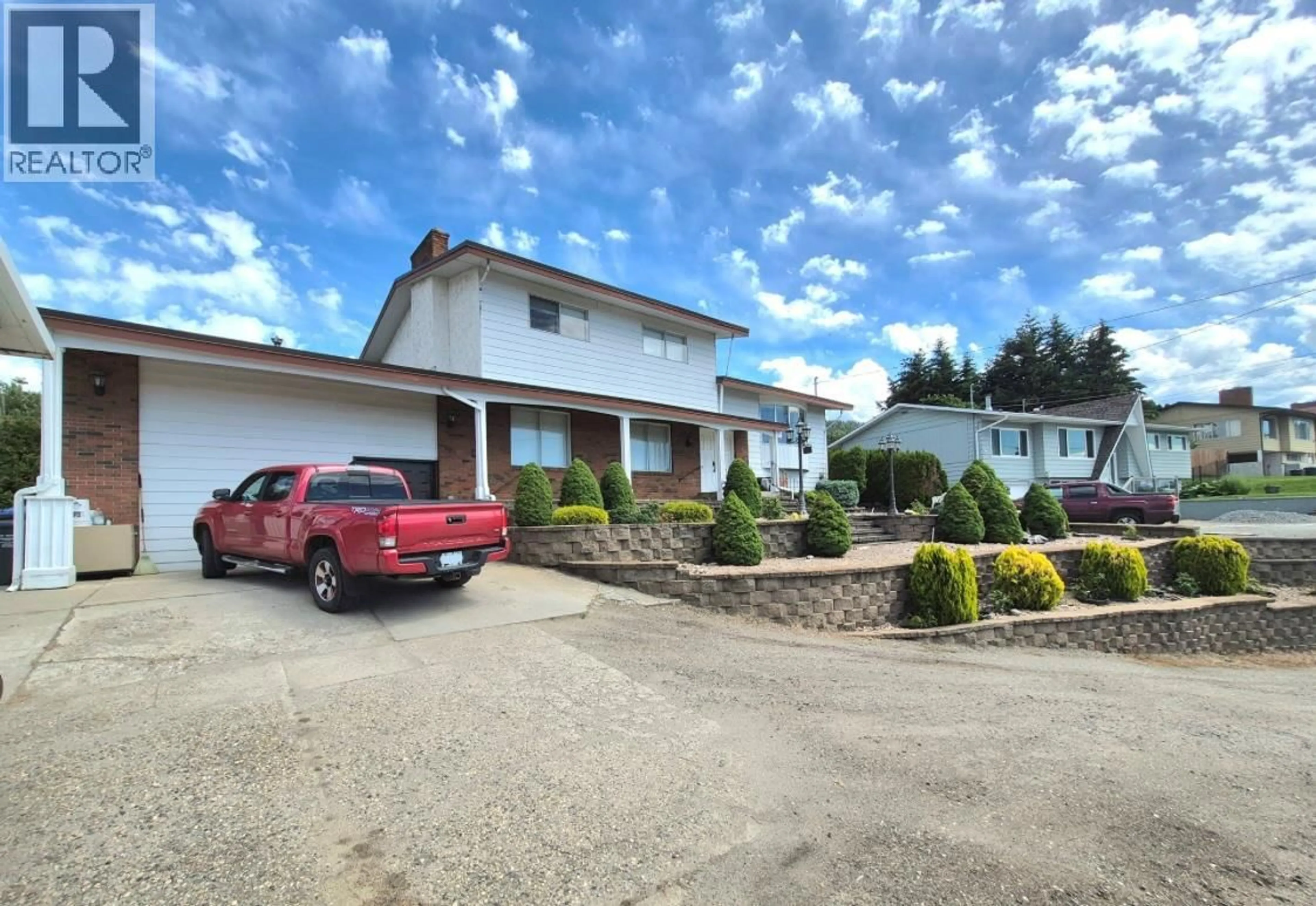 A pic from outside/outdoor area/front of a property/back of a property/a pic from drone, street for 838 MCKENZIE ROAD, Kelowna British Columbia V1X2B3