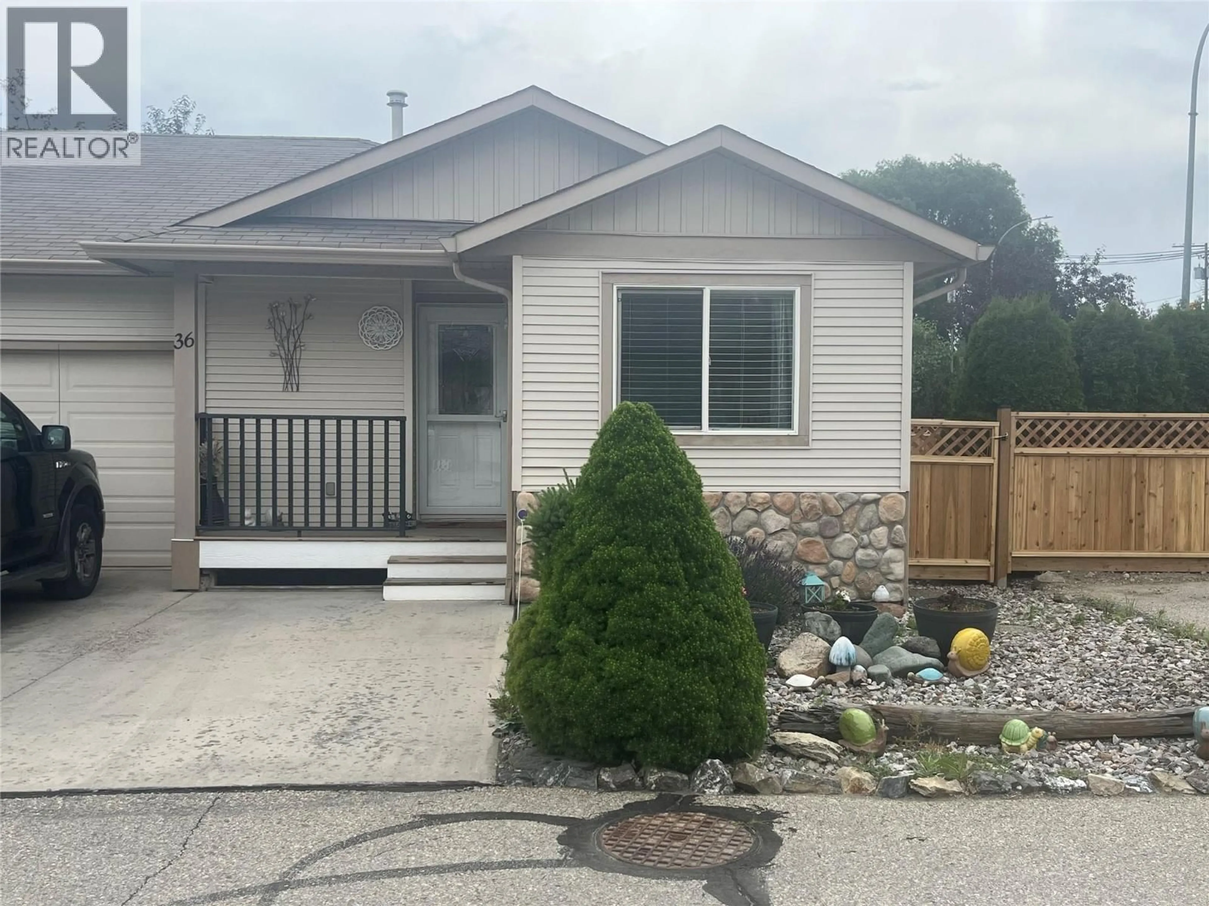 Home with vinyl exterior material, street for 36 - 5200 DALLAS DRIVE, Kamloops British Columbia V2C6Y8
