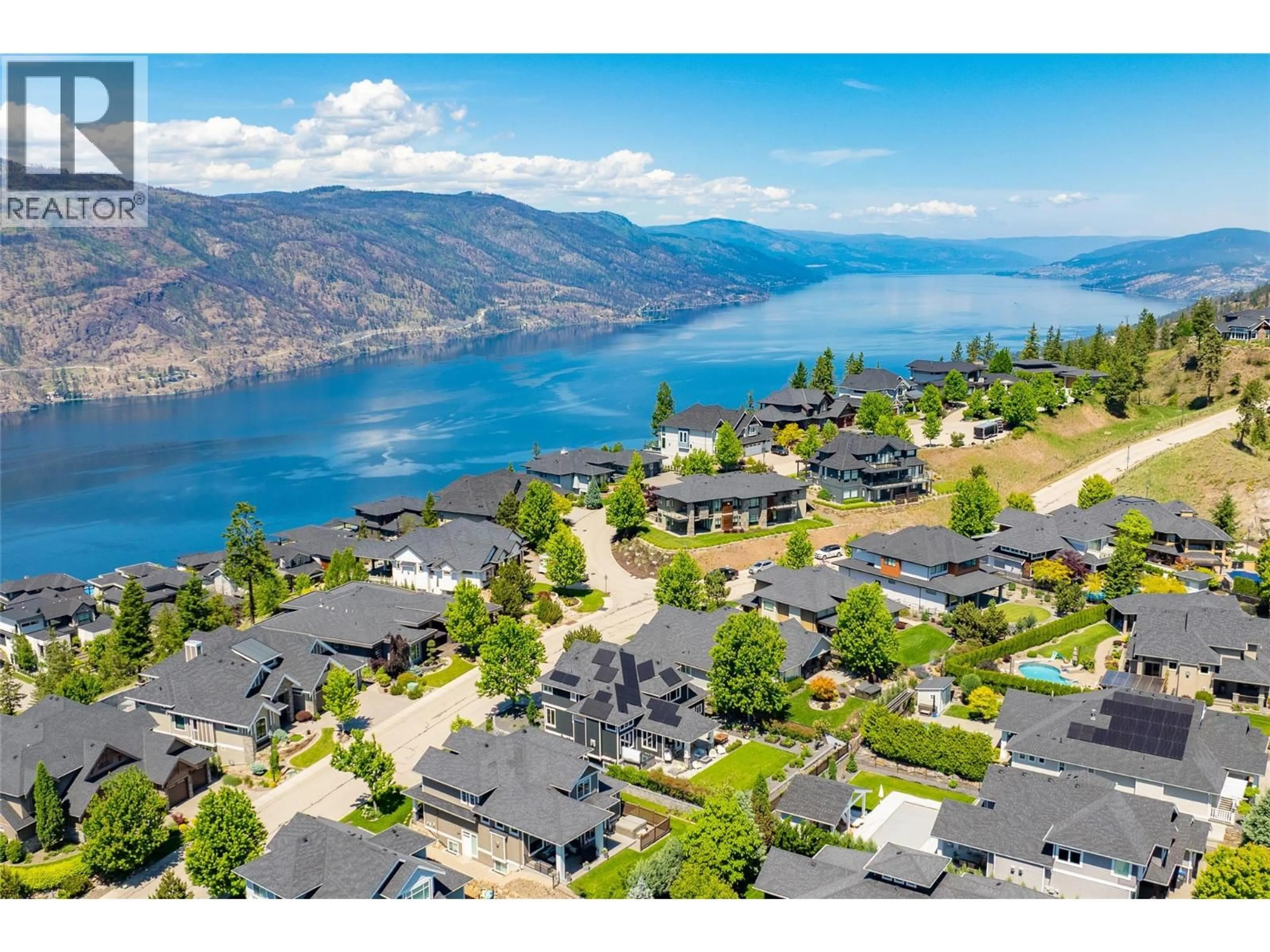 A pic from outside/outdoor area/front of a property/back of a property/a pic from drone, water/lake/river/ocean view for 147 SKYLAND DRIVE, Kelowna British Columbia V1V3A2