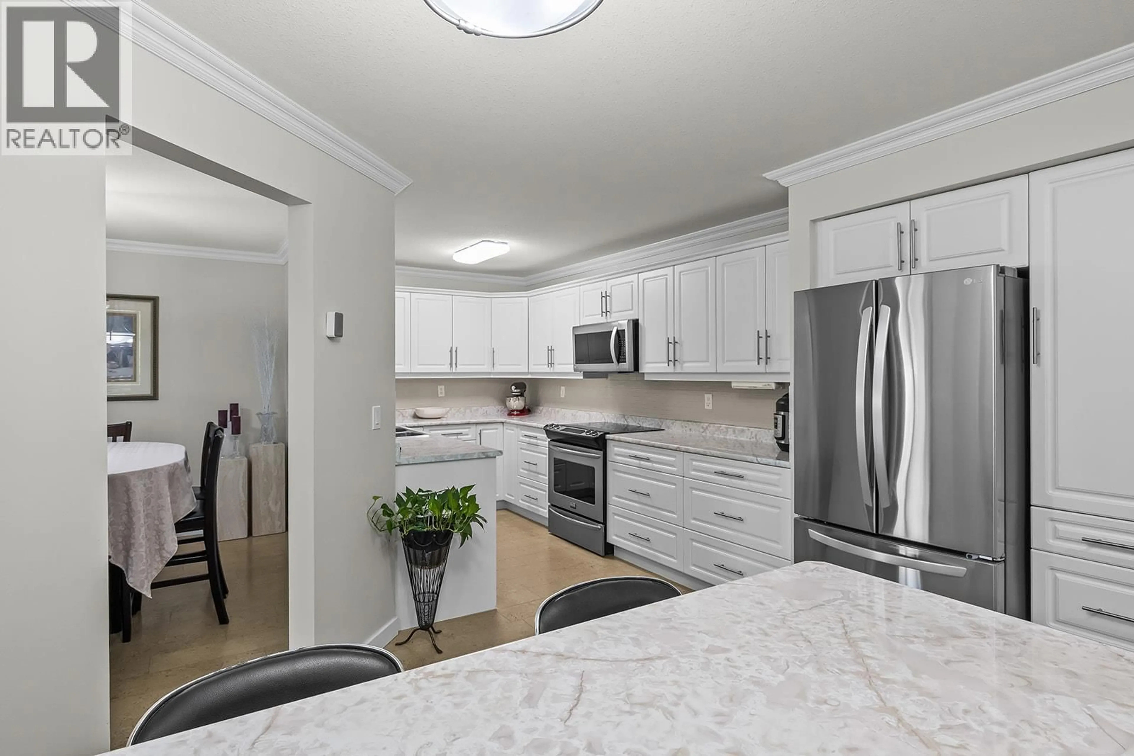 Open concept kitchen, unknown for 316 - 1329 KLO ROAD, Kelowna British Columbia V1W3N9