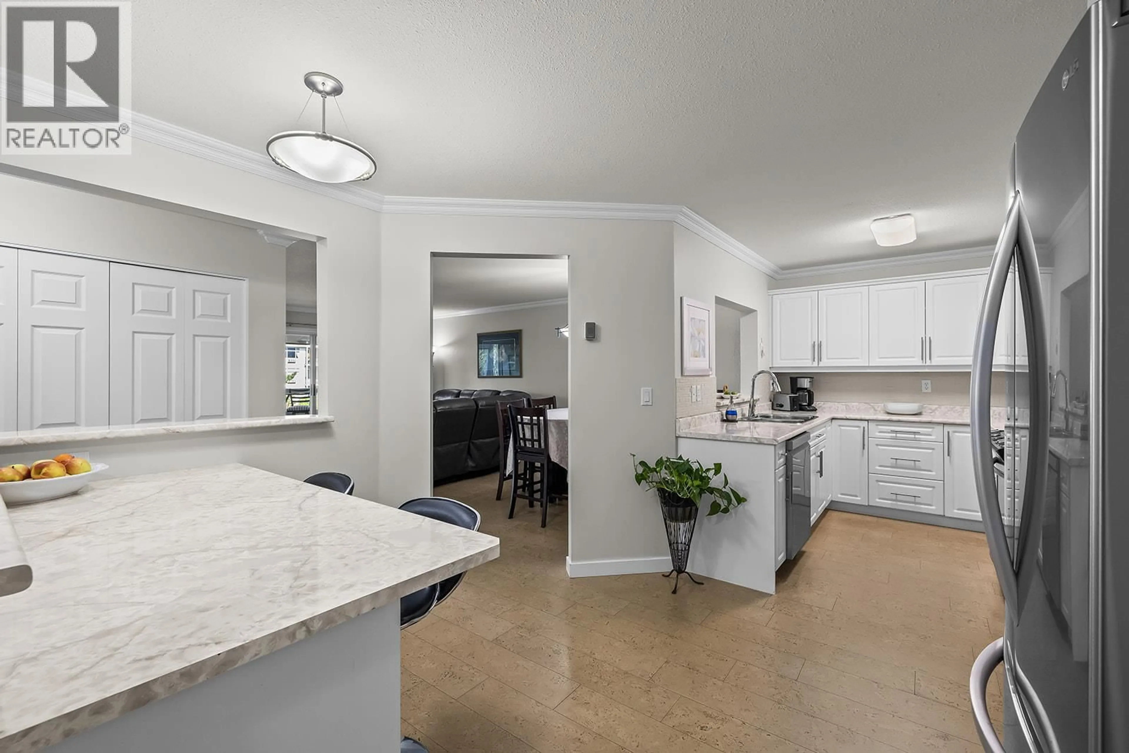 Open concept kitchen, ceramic/tile floor for 316 - 1329 KLO ROAD, Kelowna British Columbia V1W3N9