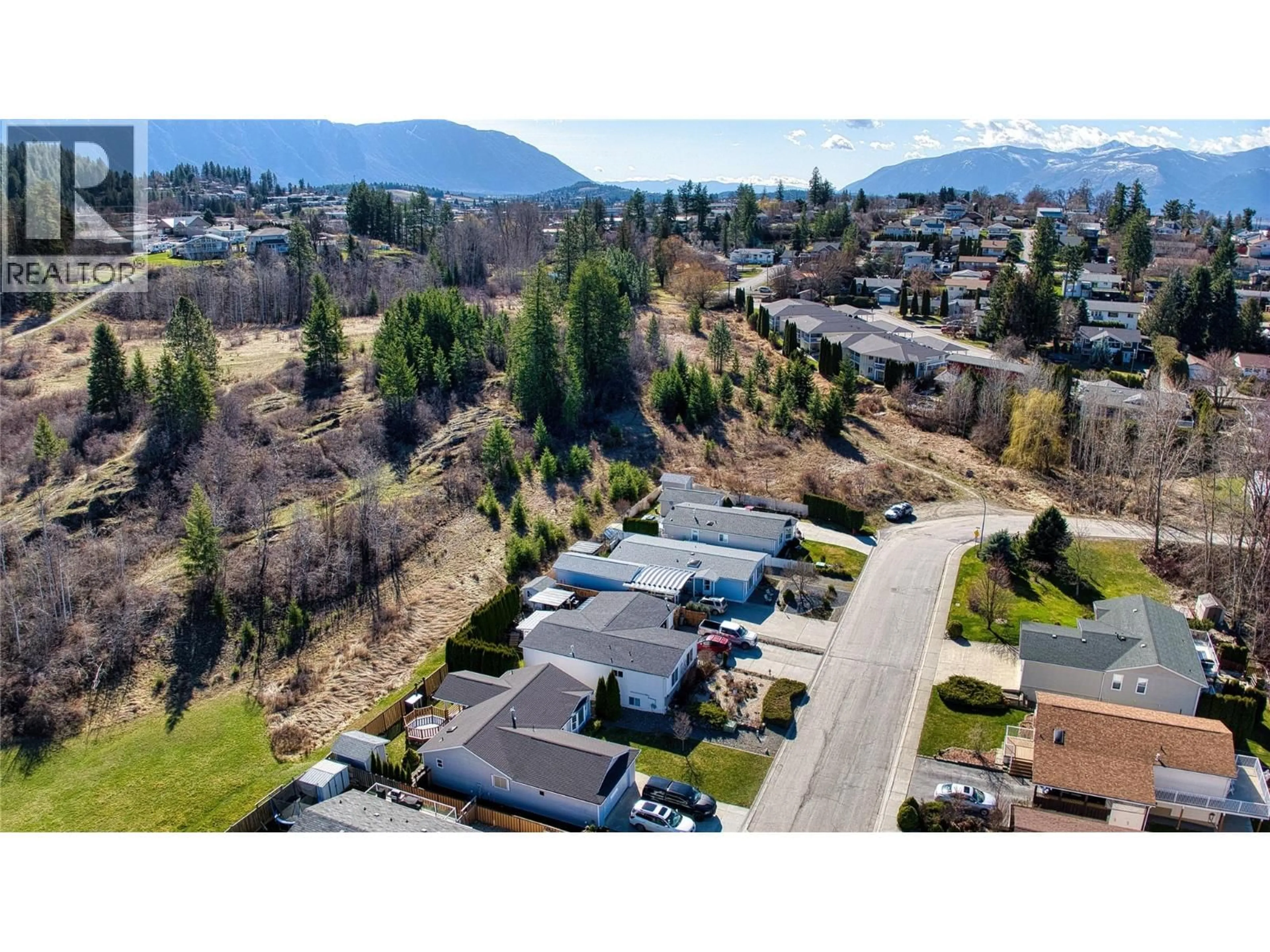 A pic from outside/outdoor area/front of a property/back of a property/a pic from drone, mountain view for 1006 11TH N AVENUE, Creston British Columbia V0B1G6