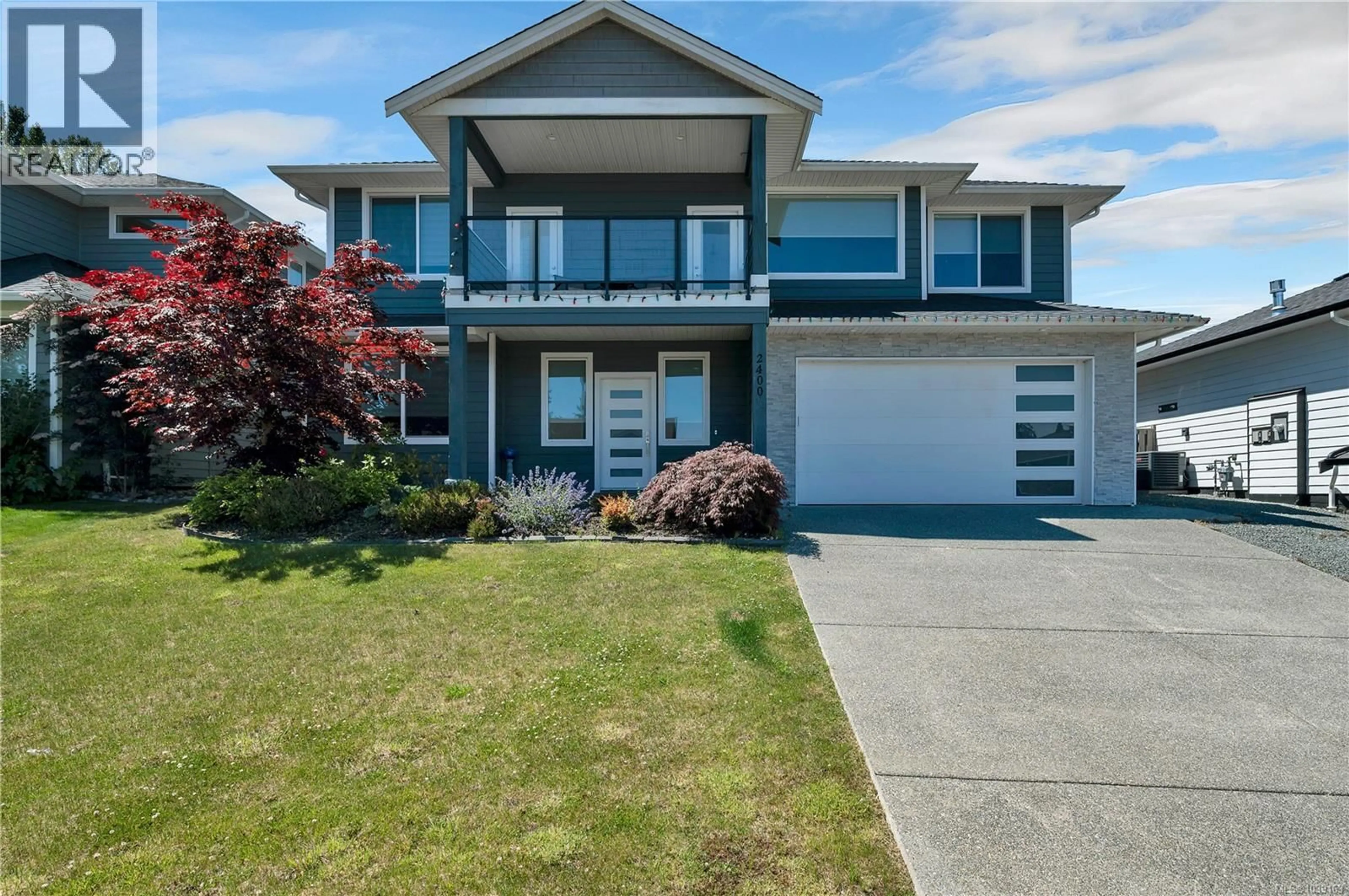 Home with vinyl exterior material, street for 2400 PENFIELD ROAD, Campbell River British Columbia V9W0E6