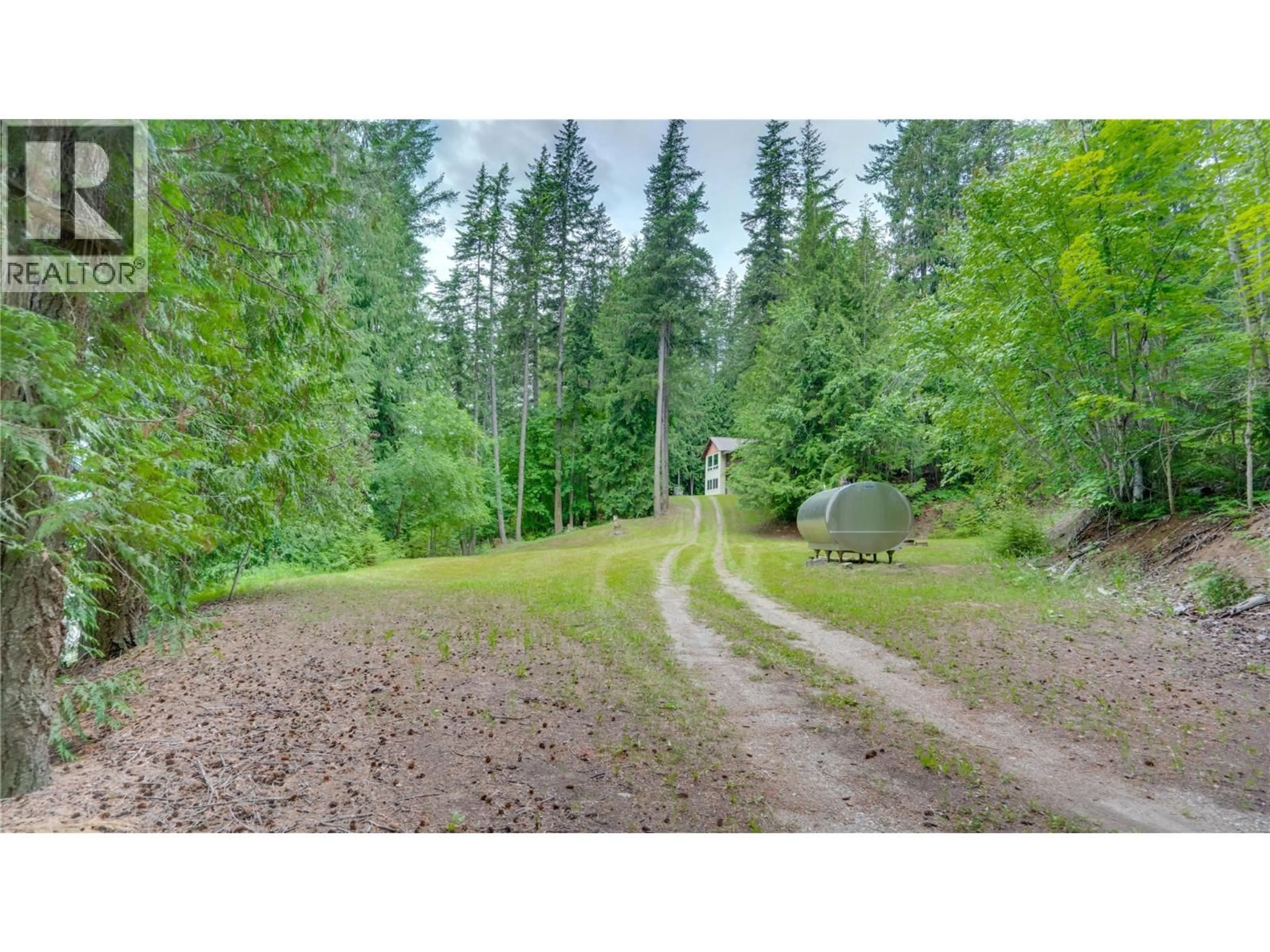 A pic from outside/outdoor area/front of a property/back of a property/a pic from drone, forest/trees view for 454 GRANDVIEW BENCH ROAD, Salmon Arm British Columbia V1E2Y4