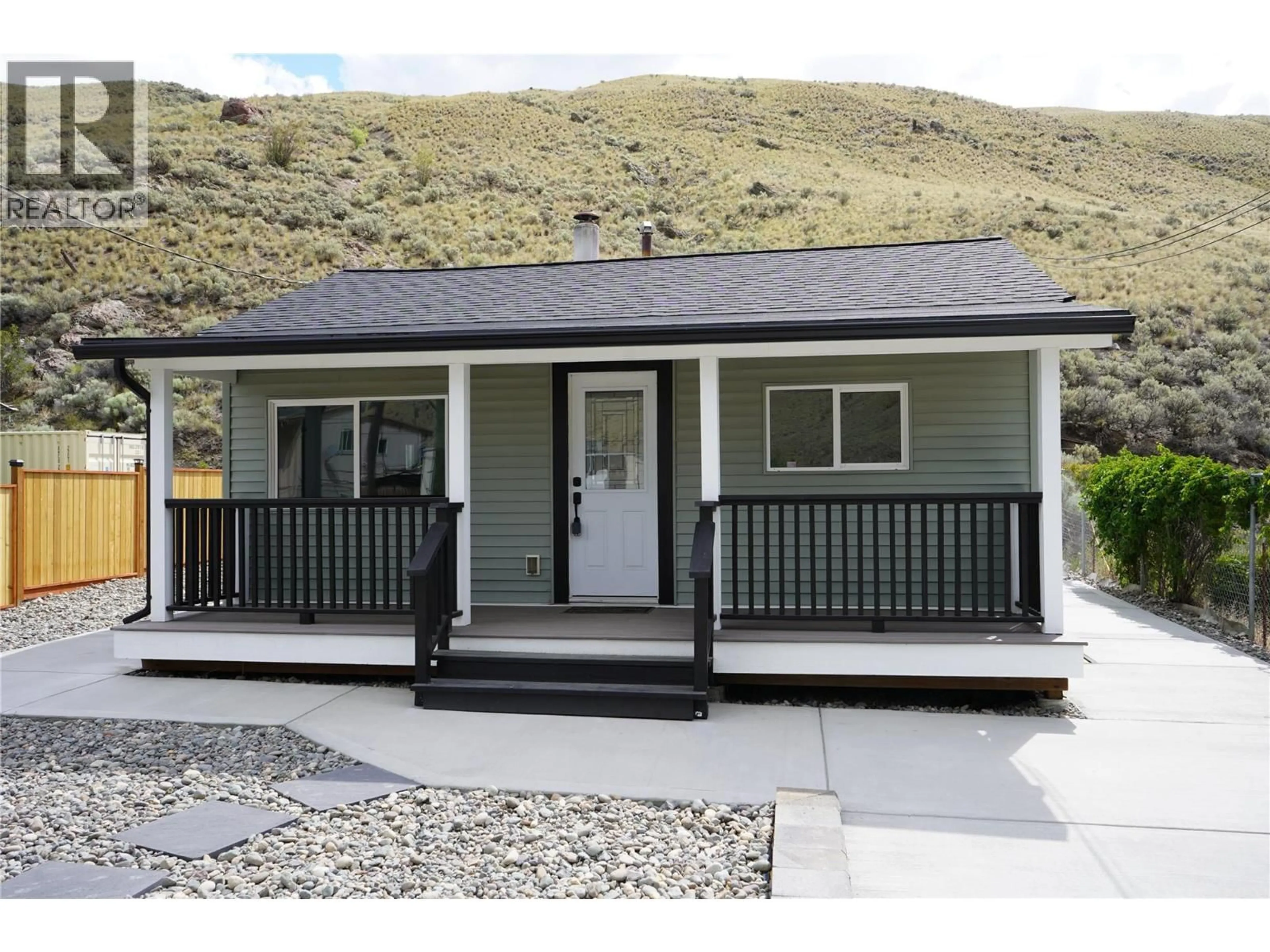 Home with vinyl exterior material, street for 1091 COLLINS ROAD, Cache Creek British Columbia V0K1H0