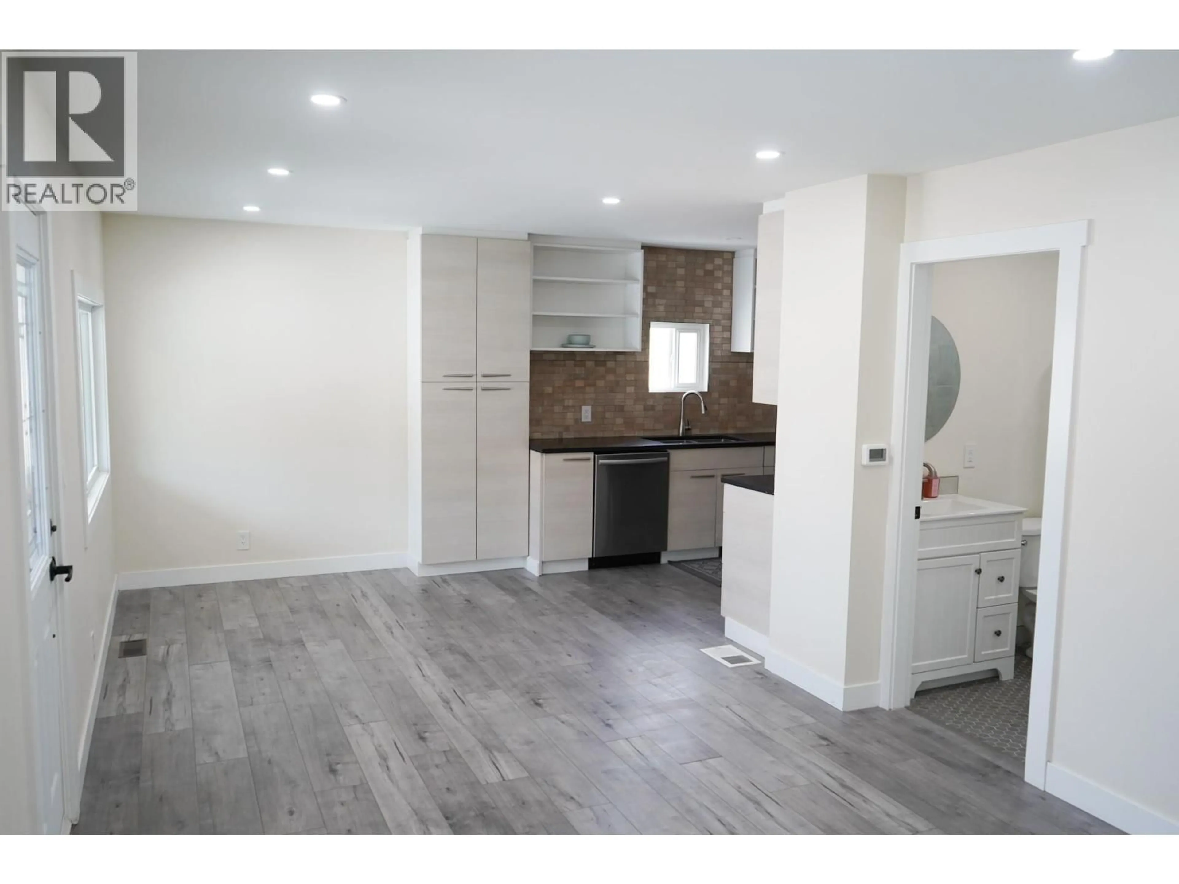 Open concept kitchen, wood/laminate floor for 1091 COLLINS ROAD, Cache Creek British Columbia V0K1H0