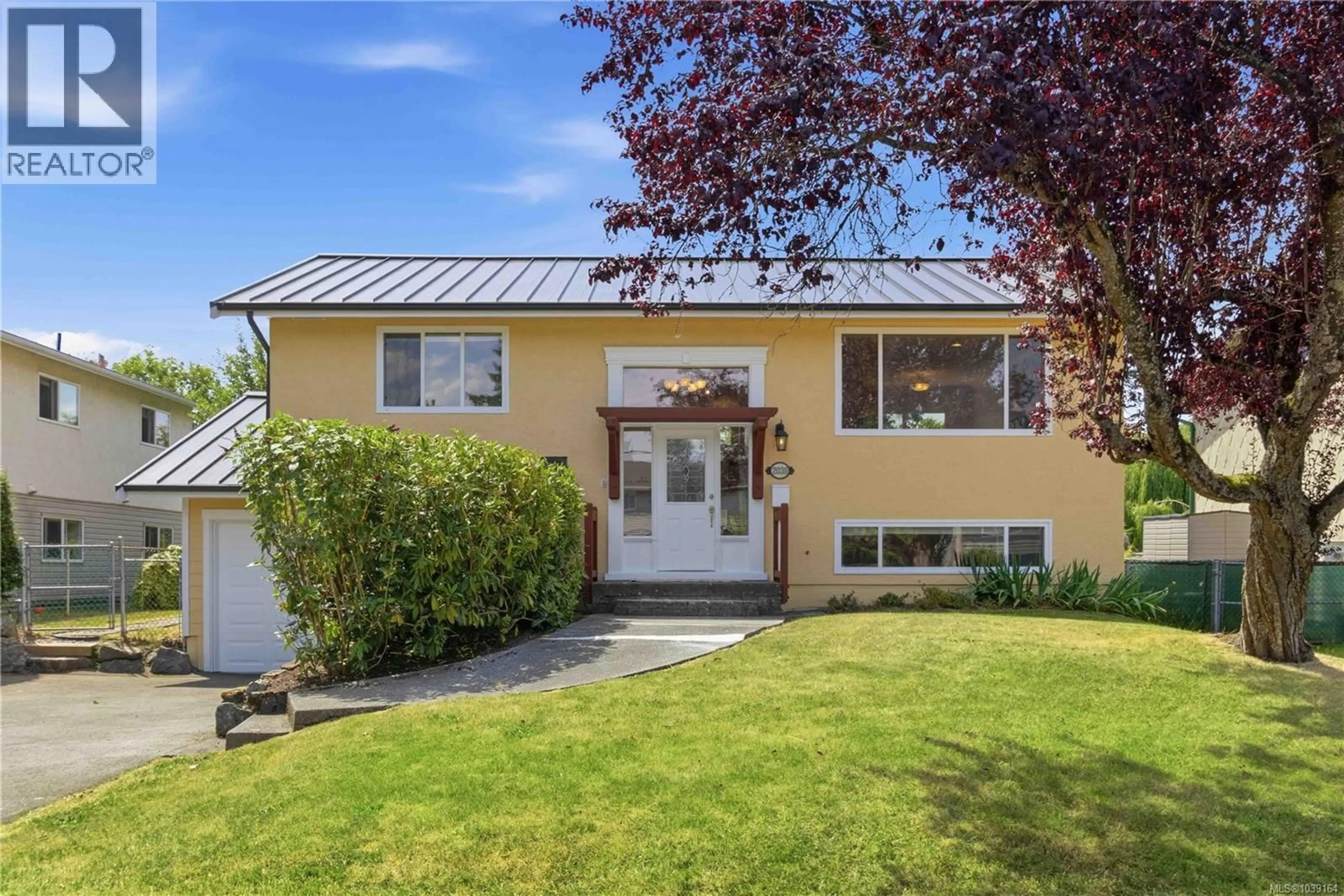 Home with vinyl exterior material, street for 2039 ARDWELL AVENUE, Sidney British Columbia V8L2L6