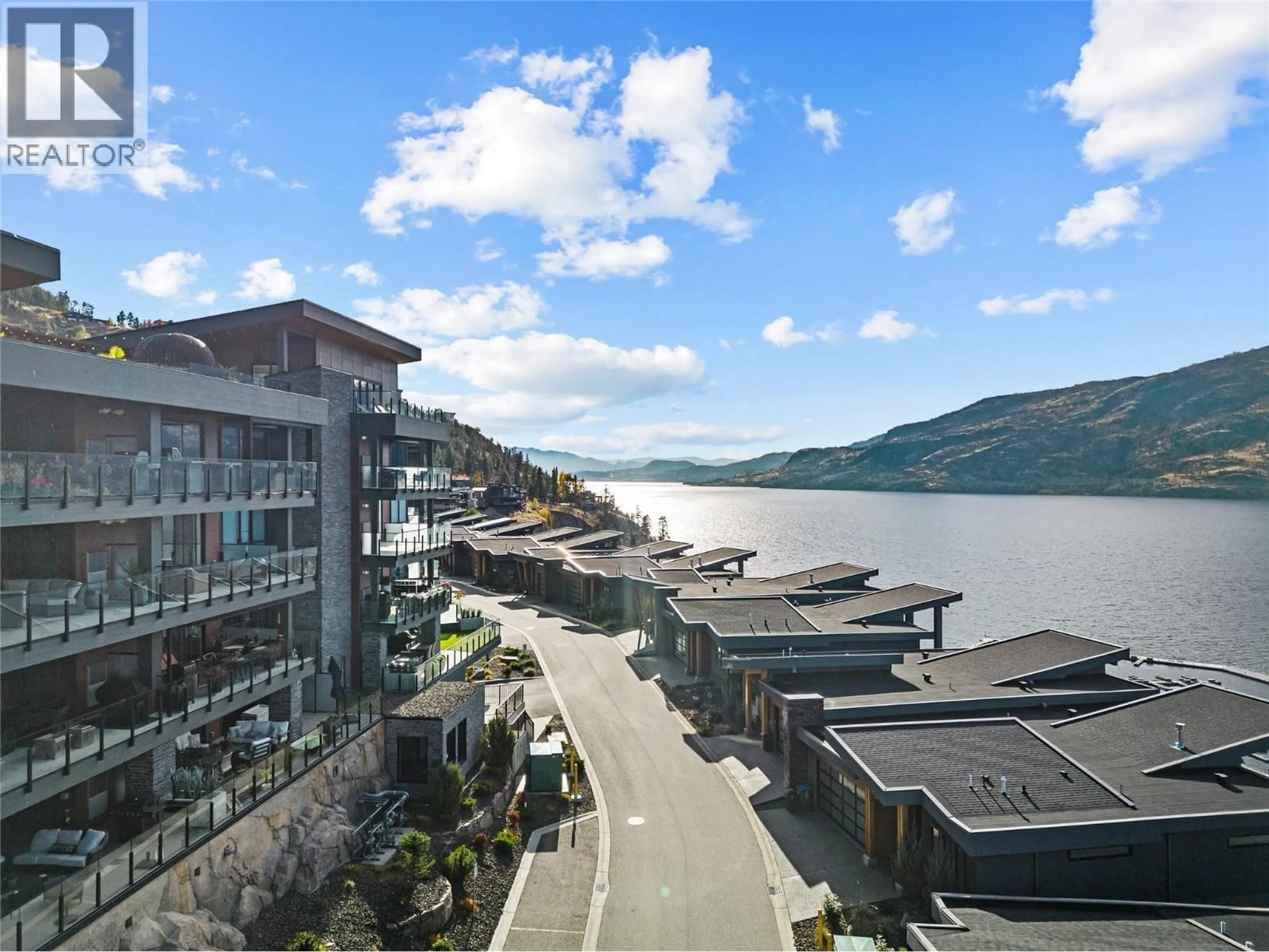 A pic from outside/outdoor area/front of a property/back of a property/a pic from drone, water/lake/river/ocean view for 210 - 3475 GRANITE CLOSE CLOSE, Kelowna British Columbia V1V0B9