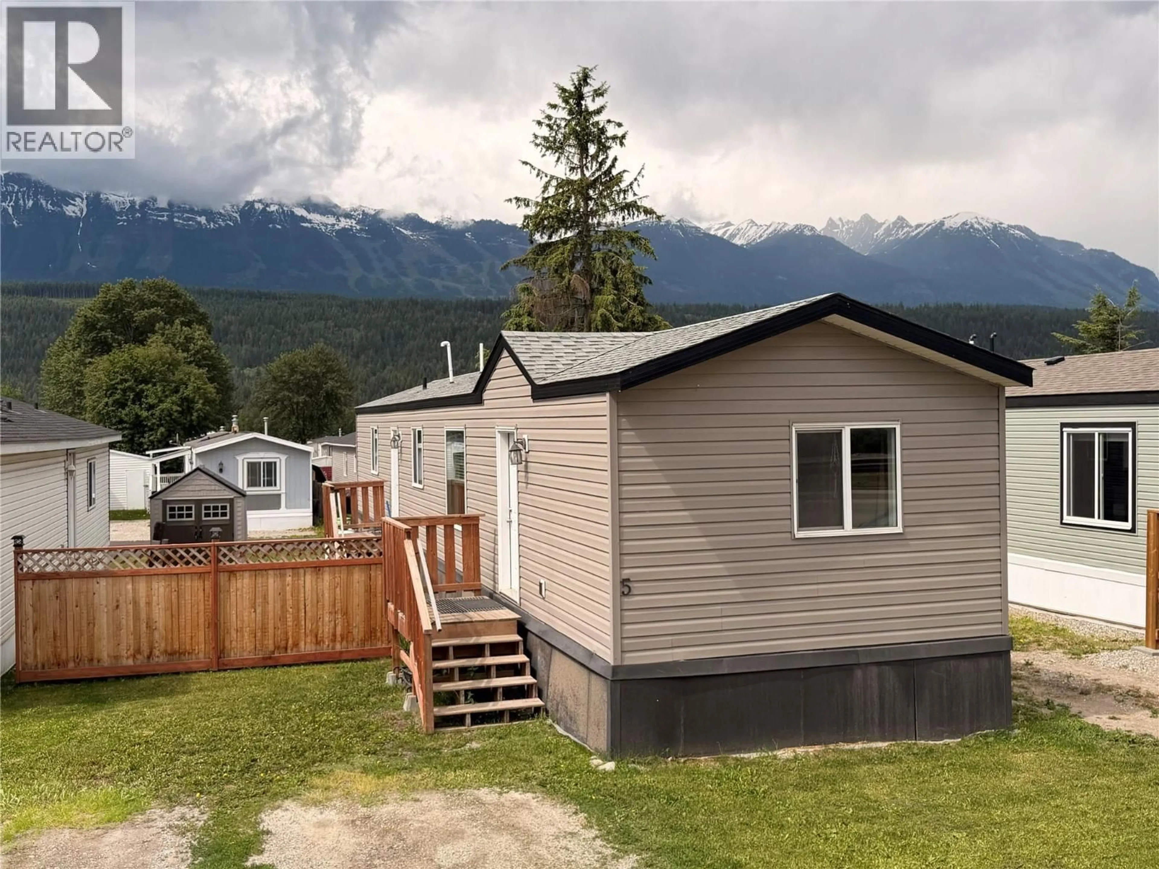 A pic from outside/outdoor area/front of a property/back of a property/a pic from drone, mountain view for 5 - 1117 10TH AVENUE, Golden British Columbia V0A1H2