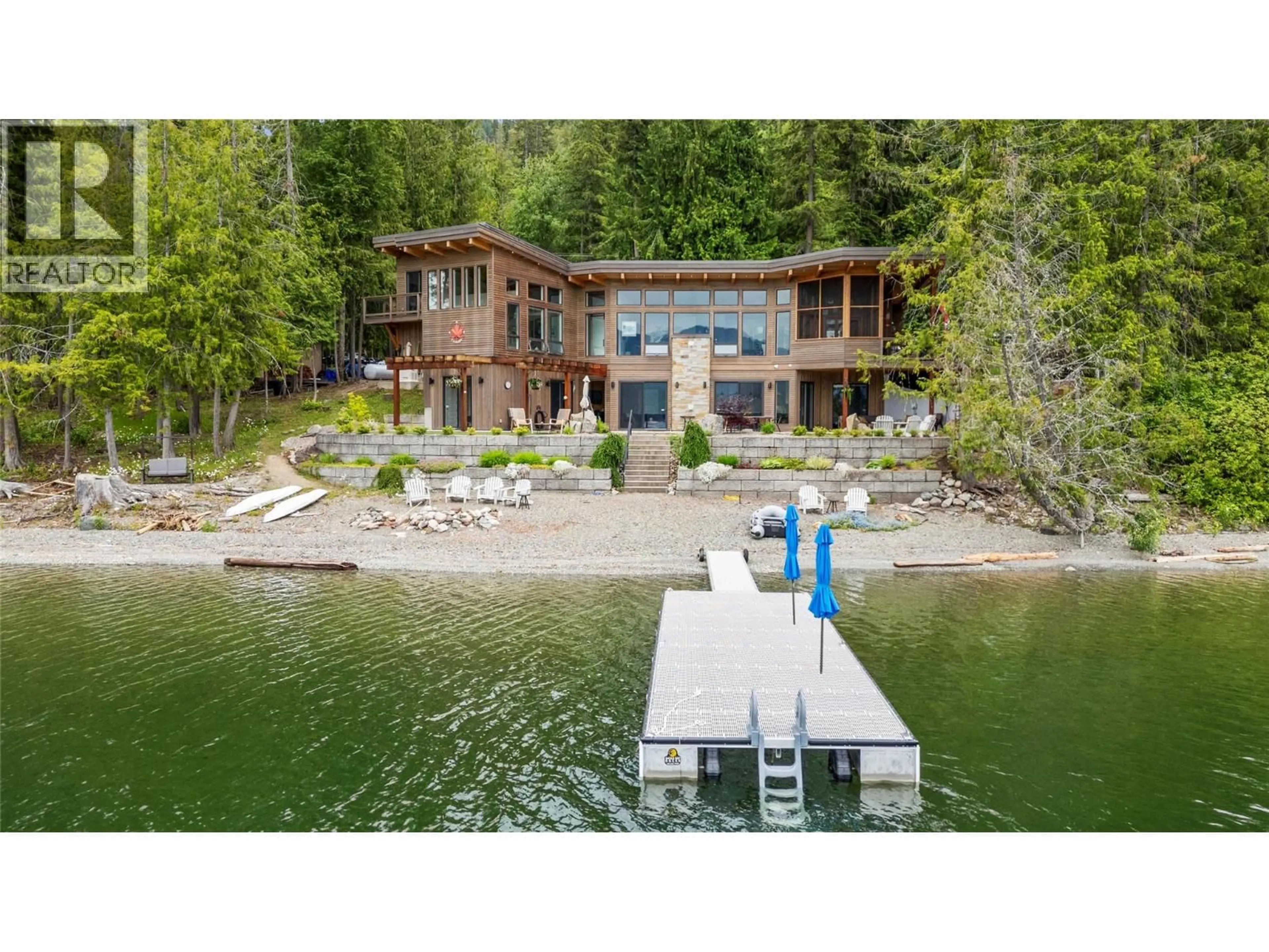 A pic from outside/outdoor area/front of a property/back of a property/a pic from drone, water/lake/river/ocean view for 4125 EAGLE BAY ROAD, Eagle Bay British Columbia V0E1T0