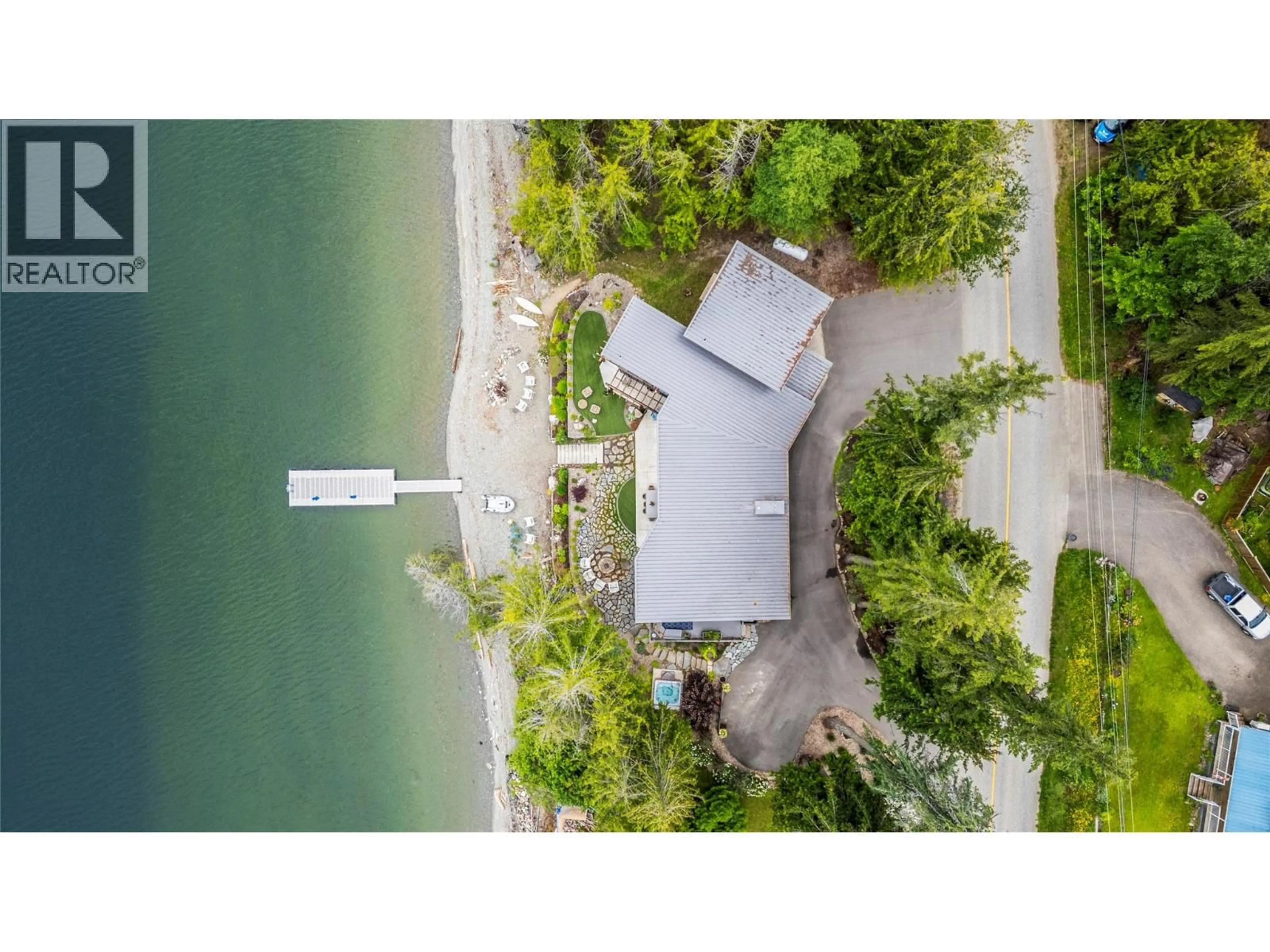 A pic from outside/outdoor area/front of a property/back of a property/a pic from drone, water/lake/river/ocean view for 4125 EAGLE BAY ROAD, Eagle Bay British Columbia V0E1T0