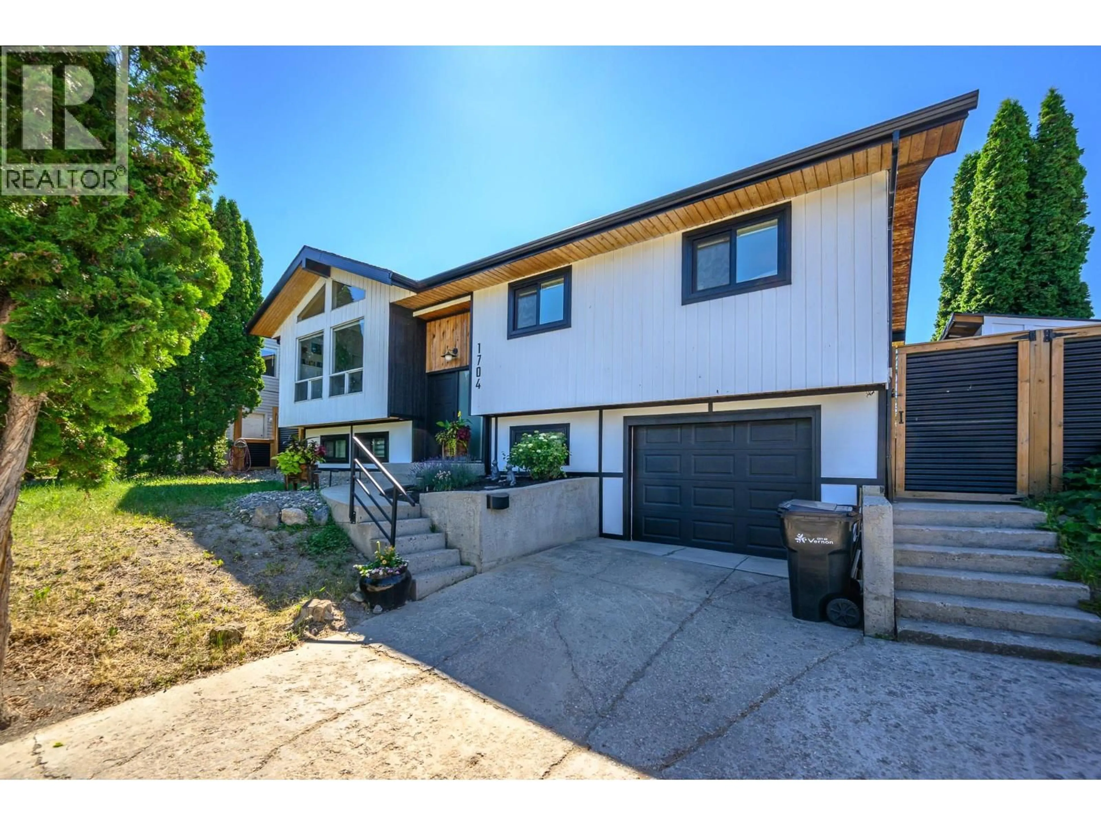 Home with brick exterior material, street for 1704 POTTERY ROAD, Vernon British Columbia V1T8M1