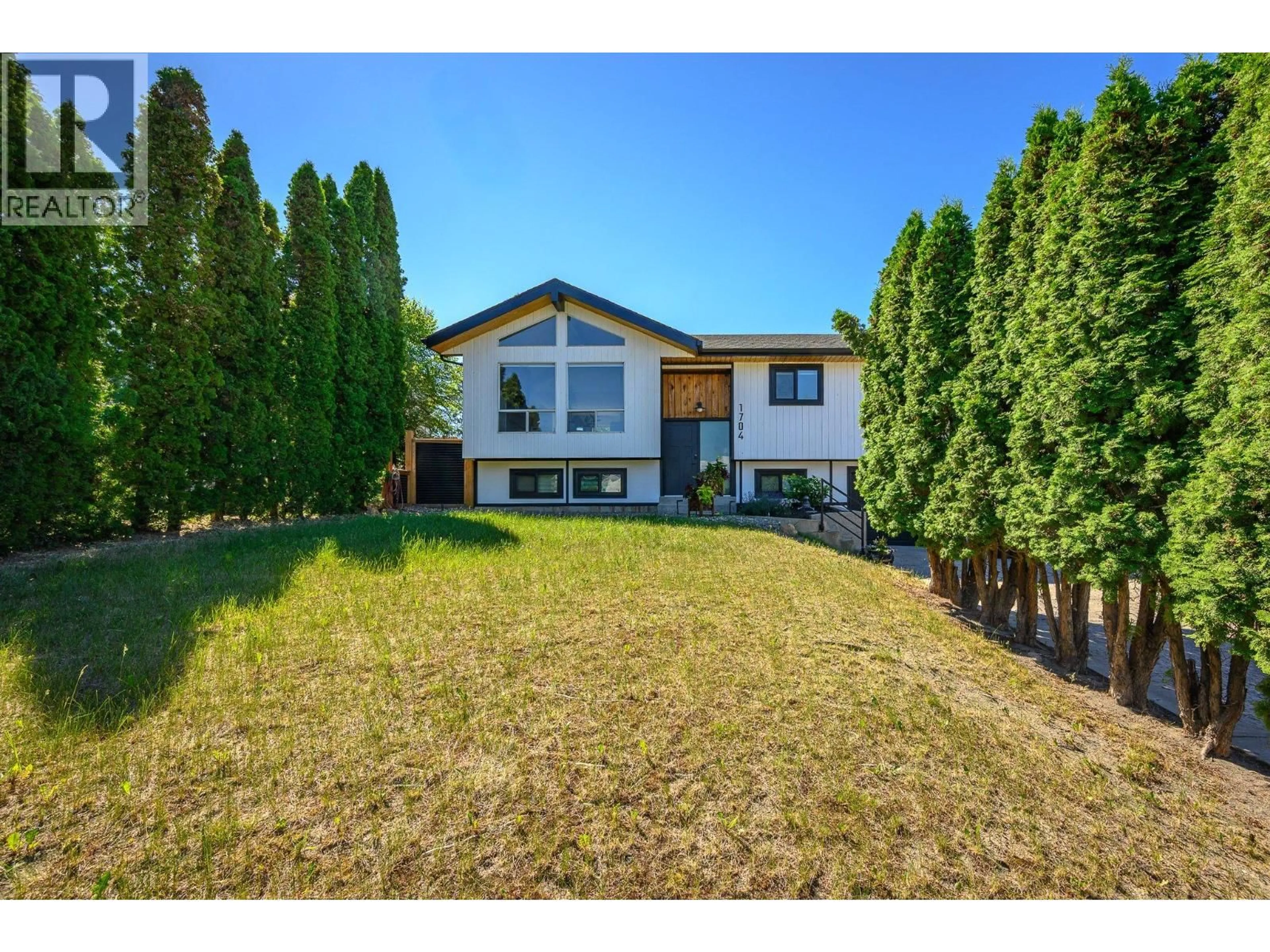 A pic from outside/outdoor area/front of a property/back of a property/a pic from drone, unknown for 1704 POTTERY ROAD, Vernon British Columbia V1T8M1