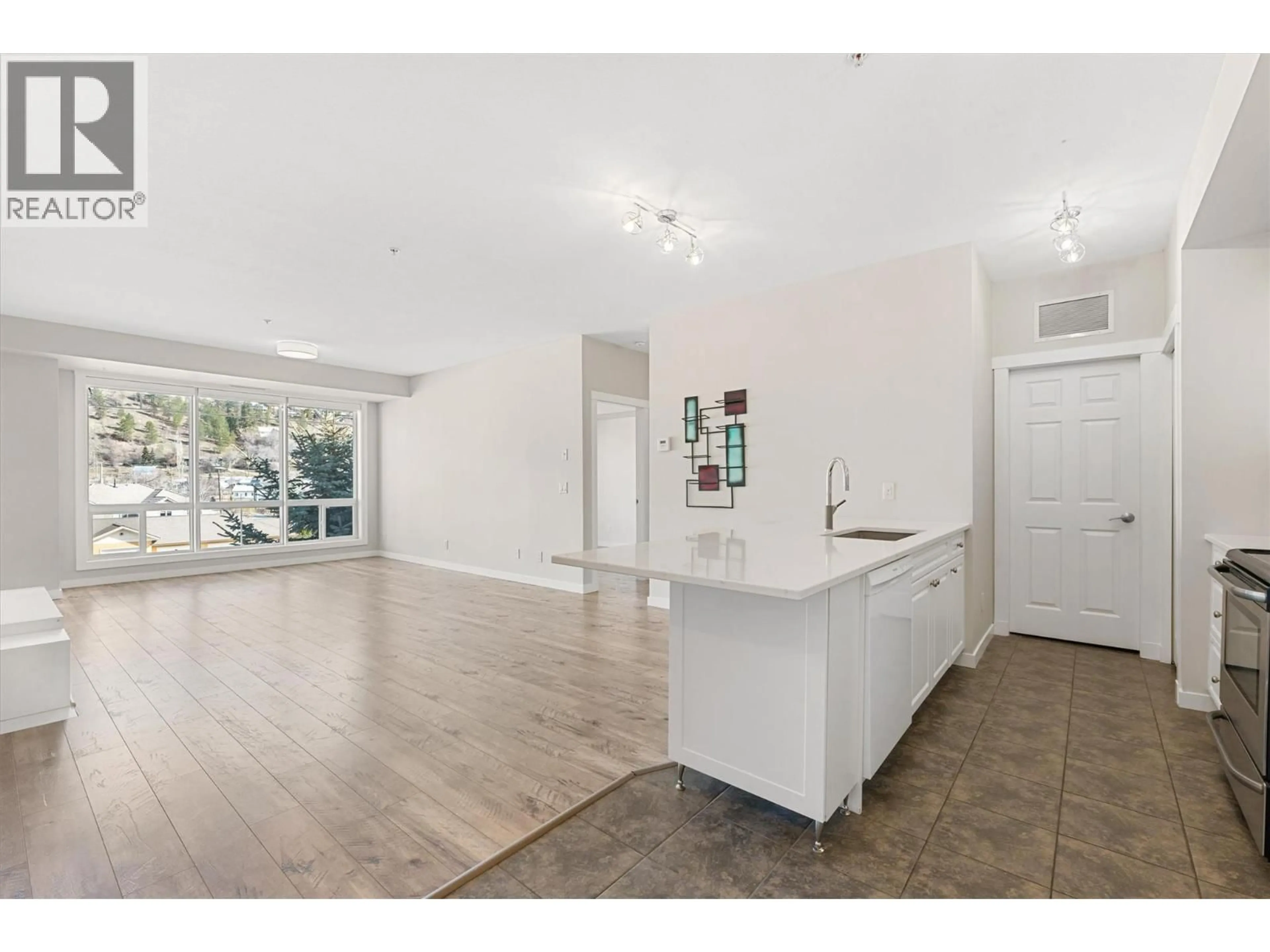 Open concept kitchen, unknown for 303 - 3550 WOODSDALE ROAD, Lake Country British Columbia V4V1Y9