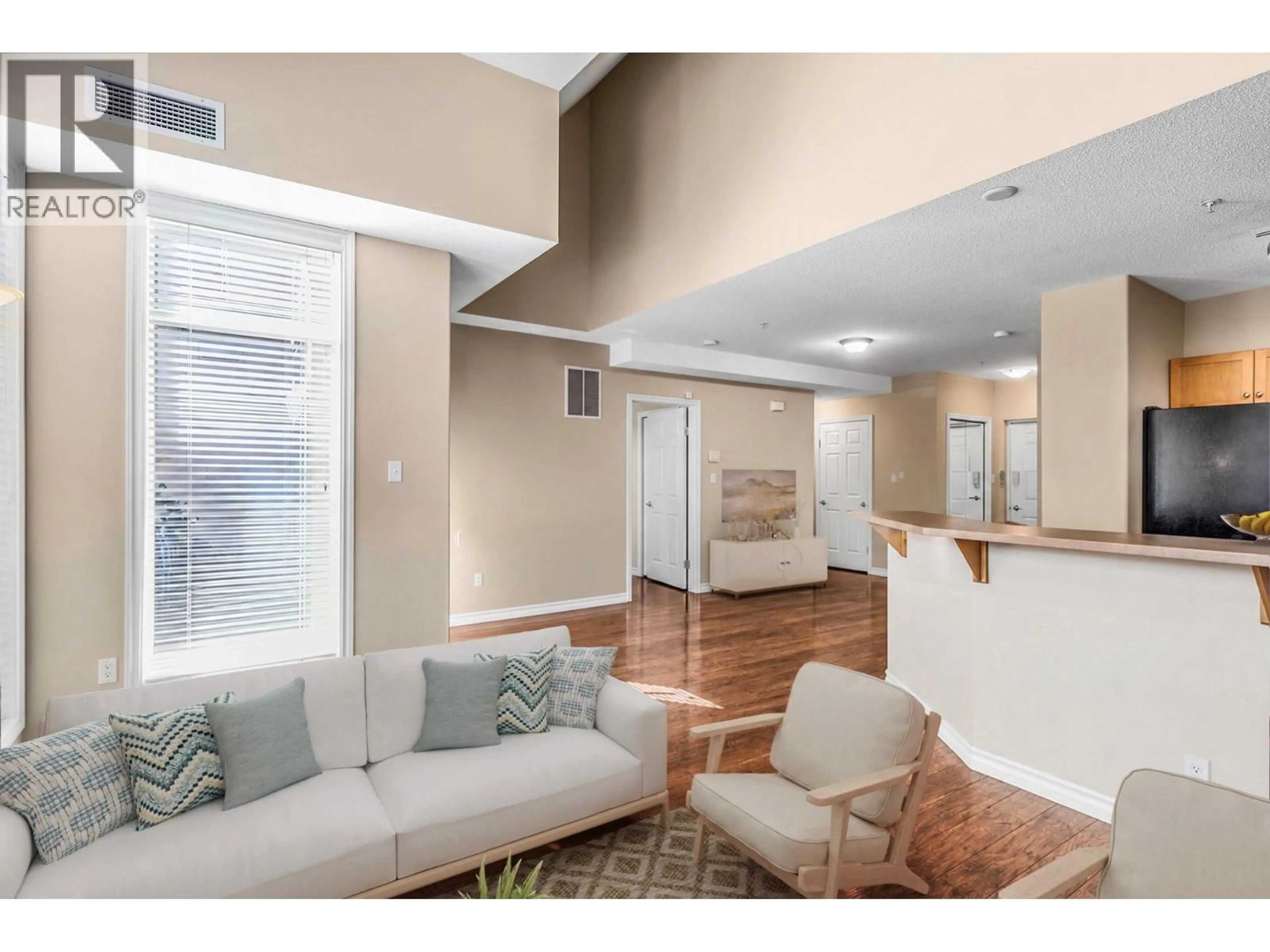 Living room with furniture, unknown for 102 - 1128 SUNSET DRIVE, Kelowna British Columbia V1Y9W1