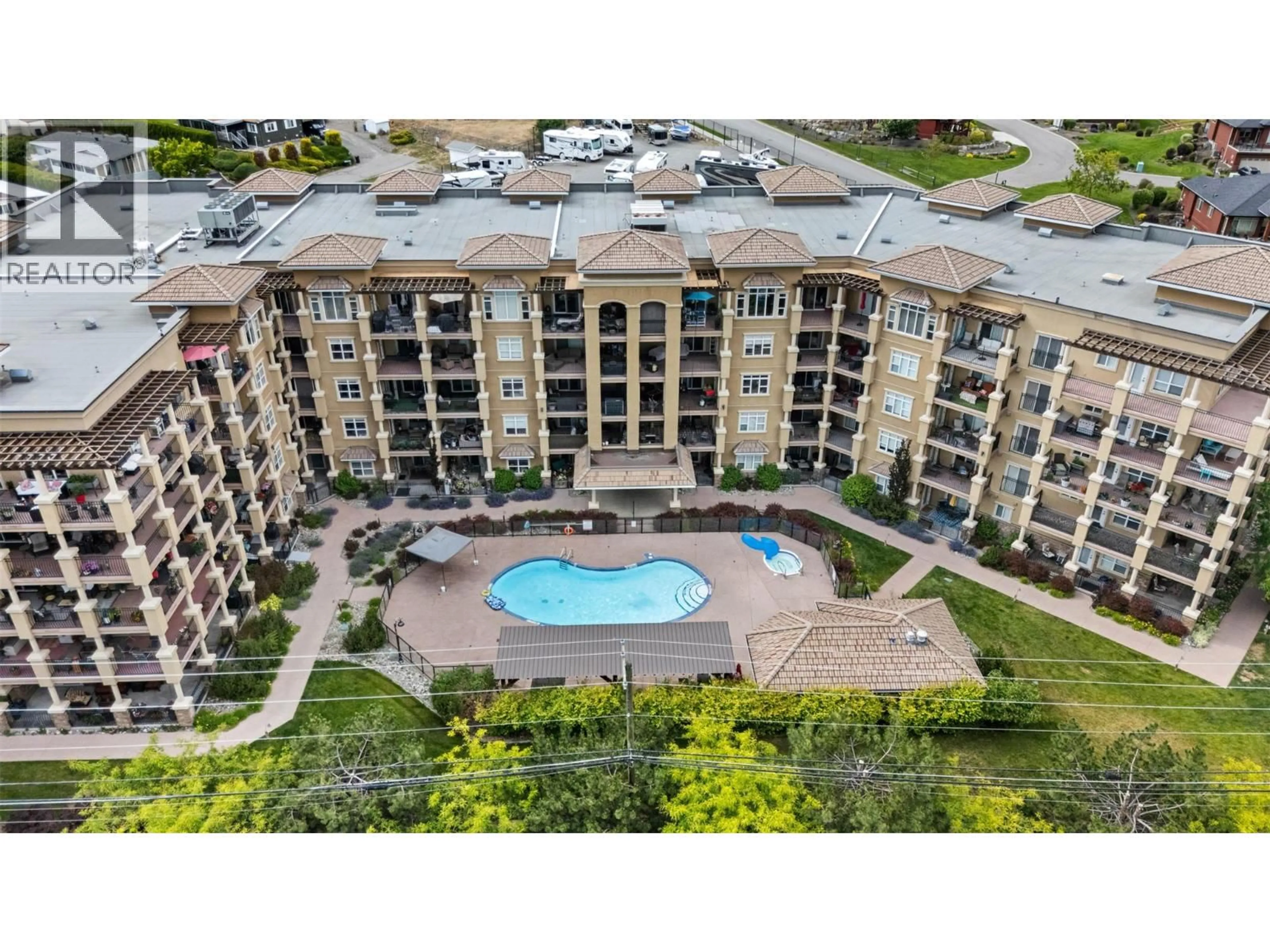 A pic from outside/outdoor area/front of a property/back of a property/a pic from drone, water/lake/river/ocean view for 301 - 2070 BOUCHERIE ROAD, West Kelowna British Columbia V4T3K9
