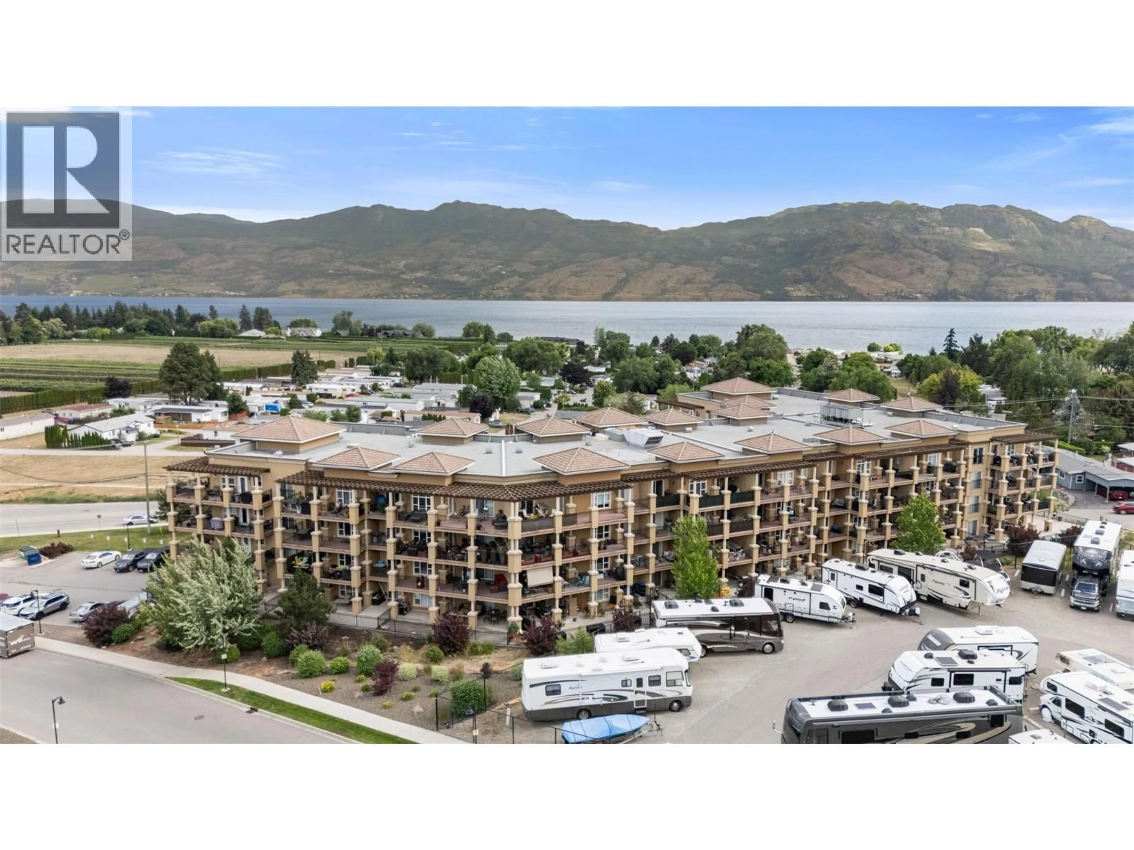 A pic from outside/outdoor area/front of a property/back of a property/a pic from drone, water/lake/river/ocean view for 301 - 2070 BOUCHERIE ROAD, West Kelowna British Columbia V4T3K9