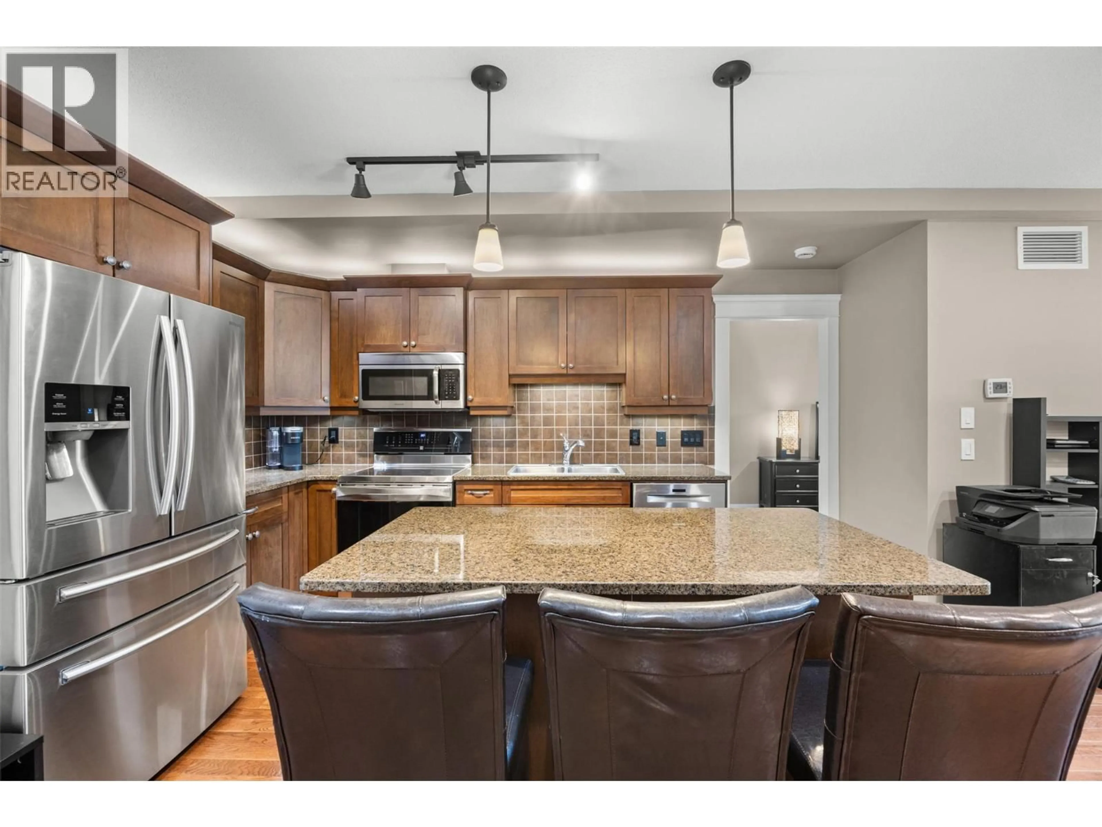 Open concept kitchen, ceramic/tile floor for 301 - 2070 BOUCHERIE ROAD, West Kelowna British Columbia V4T3K9