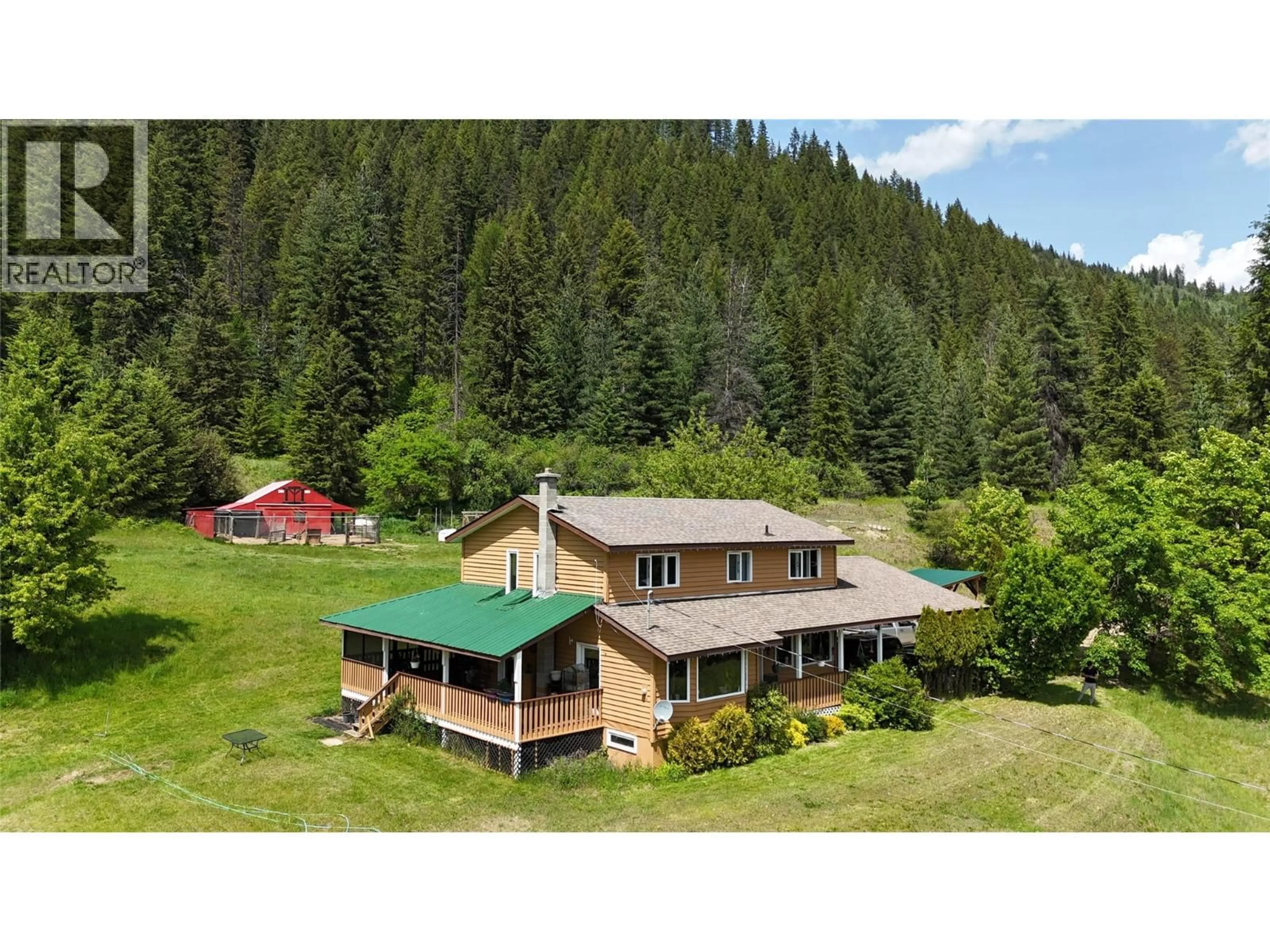 A pic from outside/outdoor area/front of a property/back of a property/a pic from drone, mountain view for 6785 PERRYS BACK ROAD, Appledale British Columbia V0G2J0